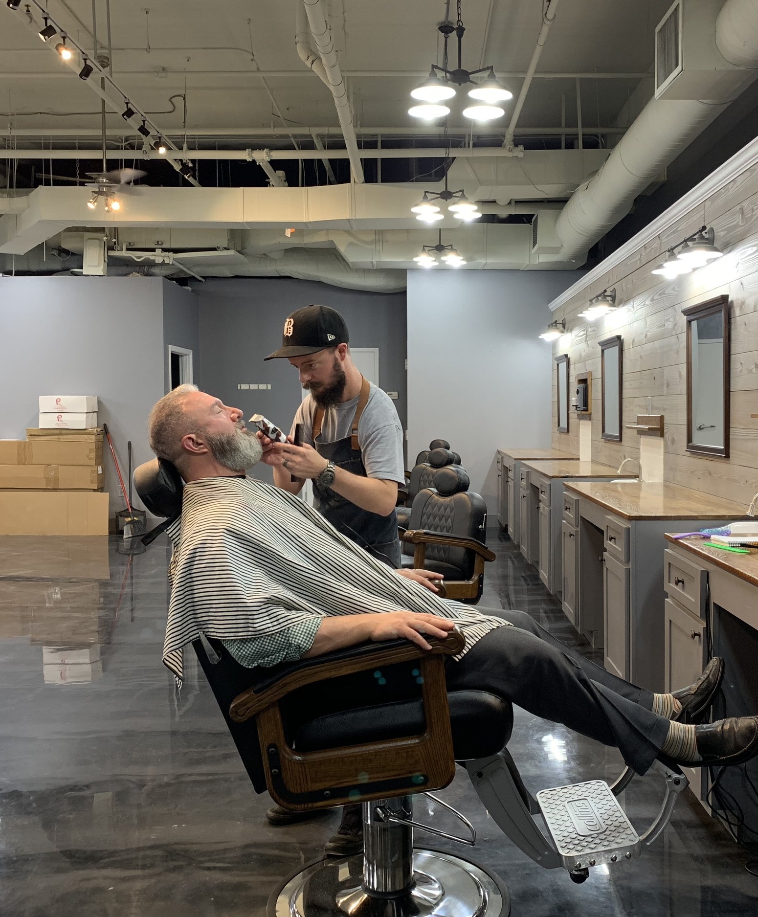 Barbershops put books in hands of kids getting haircuts