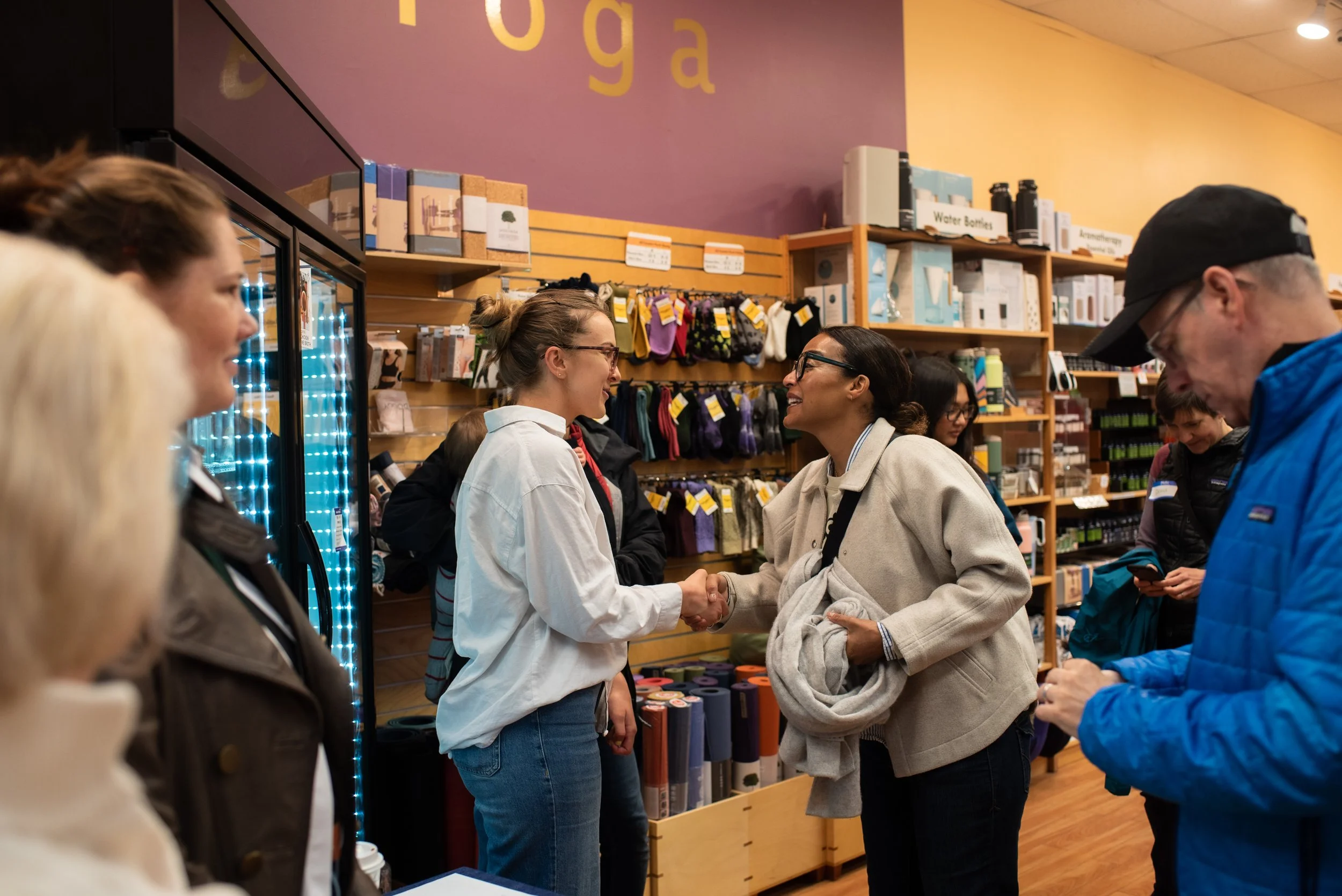 Folks networking and joining in on a B Corp scavenger hunt at Cambridge Naturals 