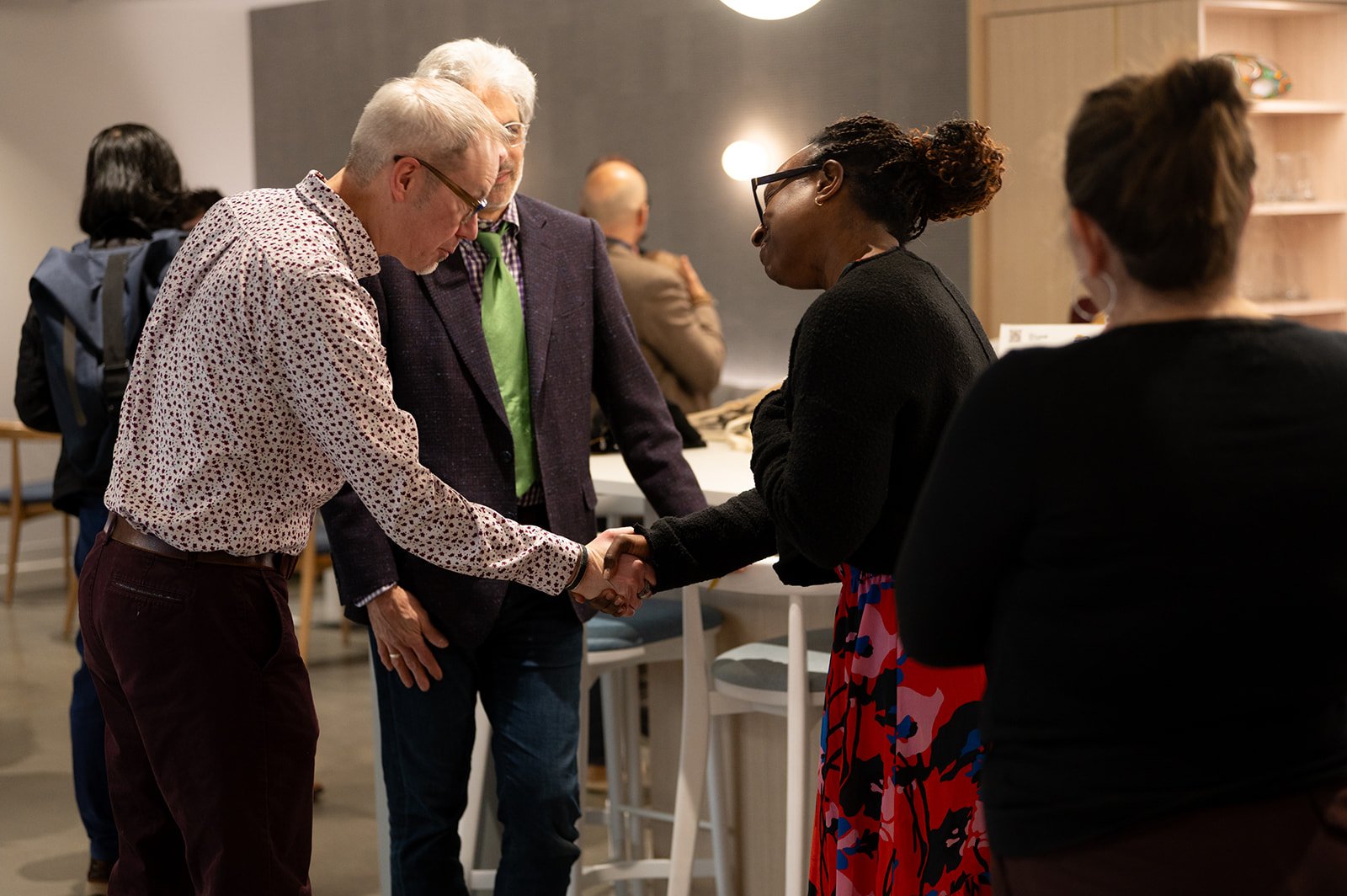 Folks networking at the Facilitating Through Change &amp; Chaos event