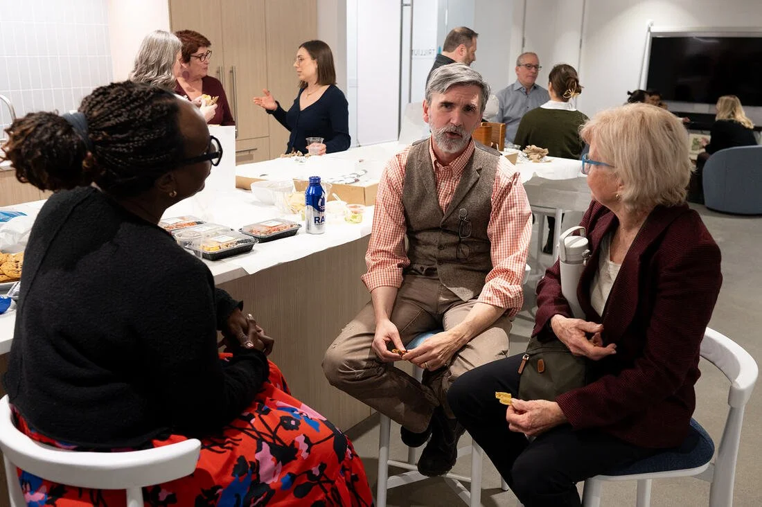 Folks networking at the Facilitating Through Change &amp; Chaos