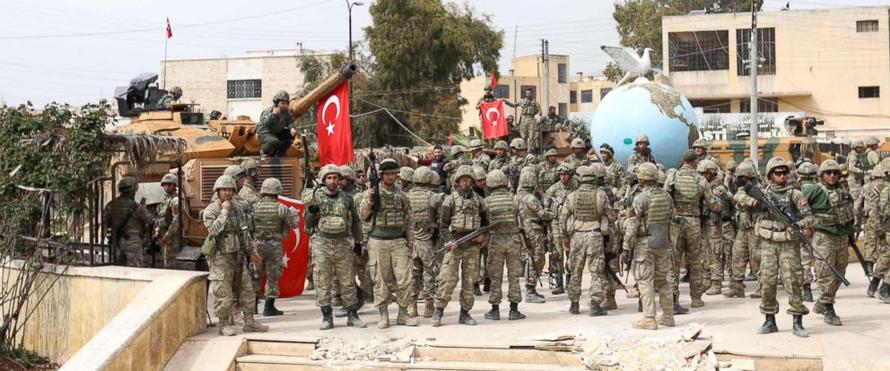 Turkish soldiers gather in the Kurdish-majority city of Afrin, via Getty