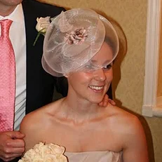 Congratulations to Anne and her husband on their wedding day. To complement her gorgeous dress, Anne wore one of my PLUME designs, featuring a light chocolate shot satin base, crin trim with handmade chiffon petals and ostrich feather centrepiece.