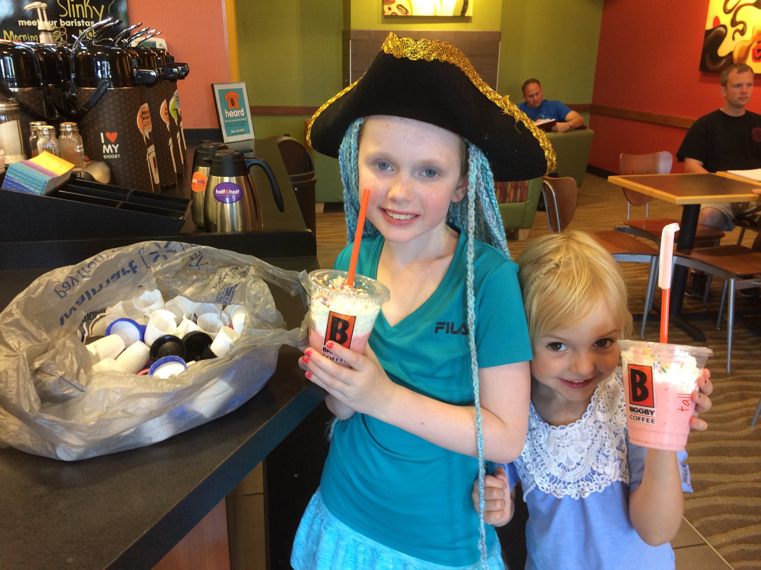 picking up caps and a drink.JPG