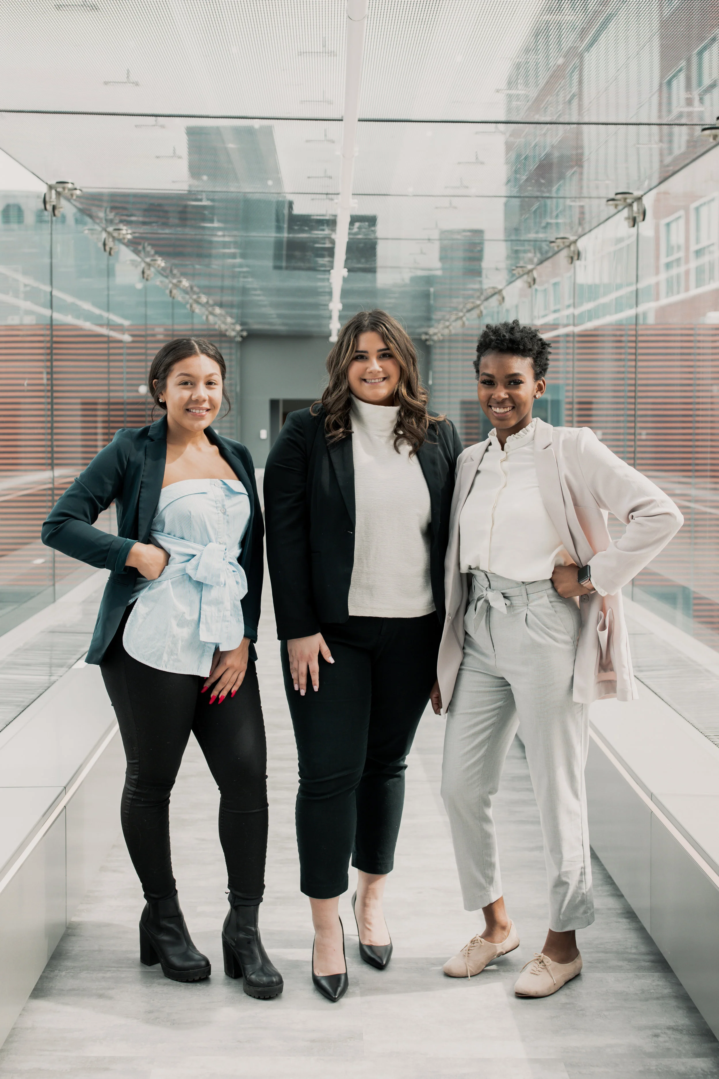 Jones, Capozzi, and Banks in the Alter Hall Skywalk. | PHOTO: Saba Ahmed
