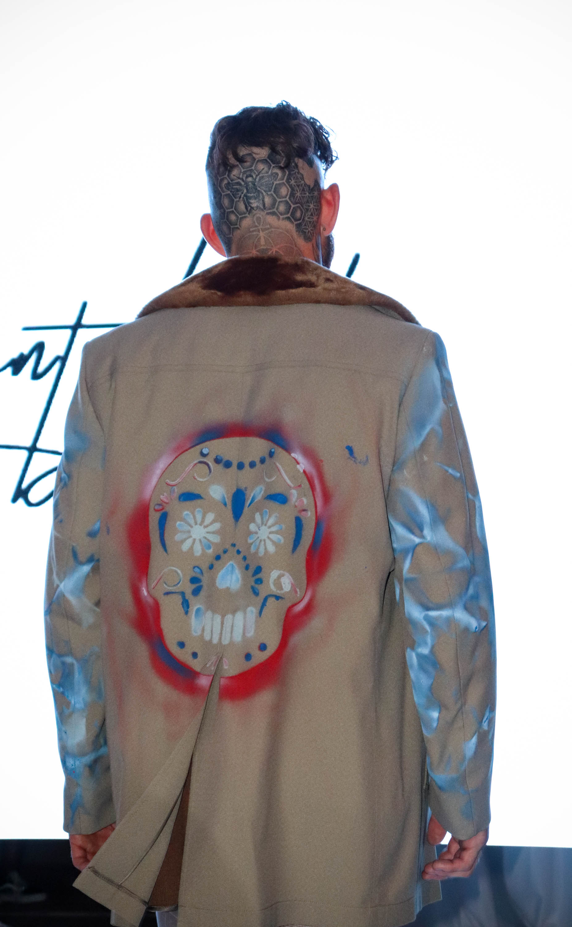 Liam Bergan walks for LaMont Lateef