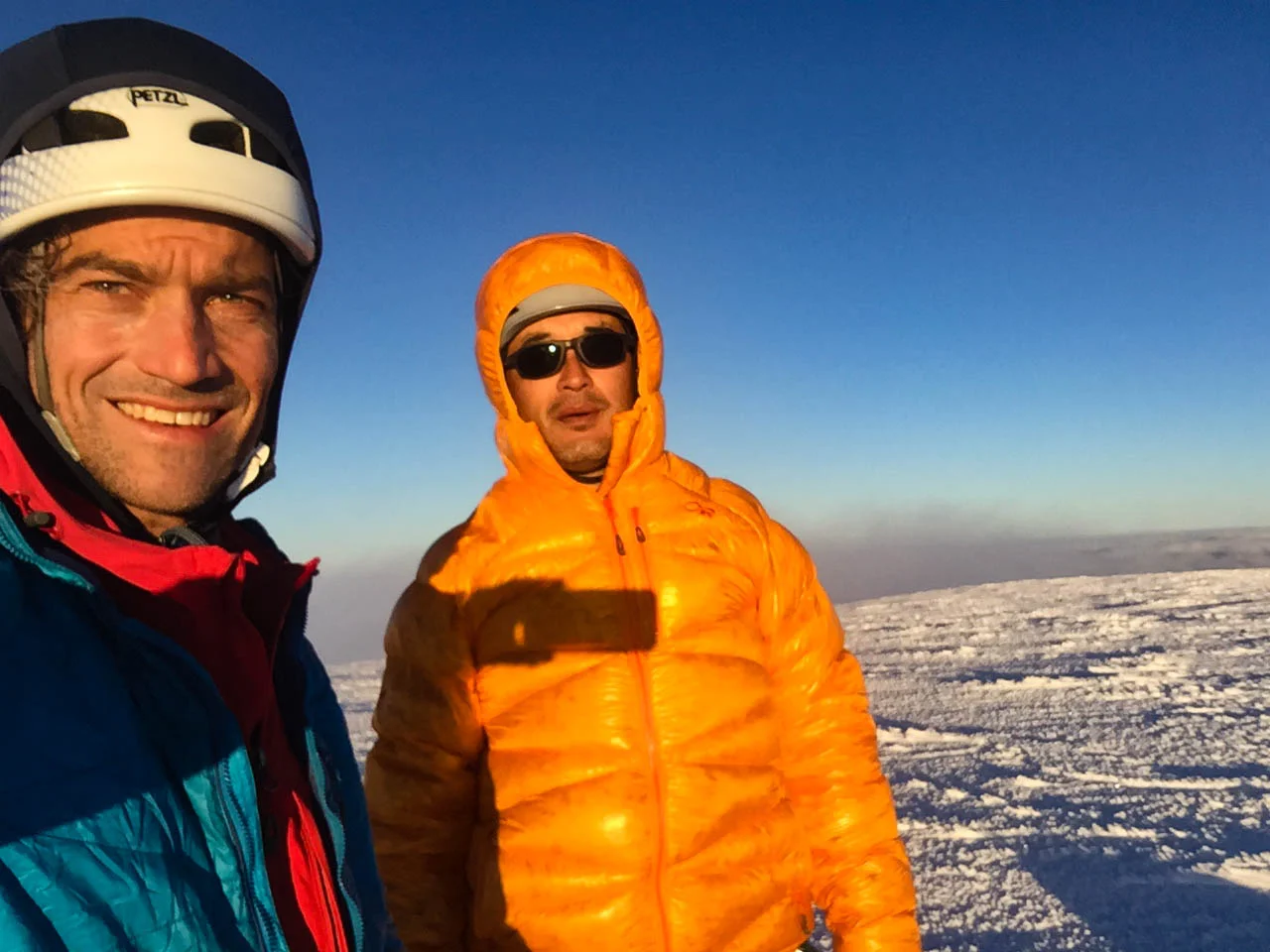 Grant Peak Summit - This is what it looks like to be physically exhausted, cold and whittled down by pain. Mark Allen, left, is faring much better. Photo: Mountain Bureau, LLC
