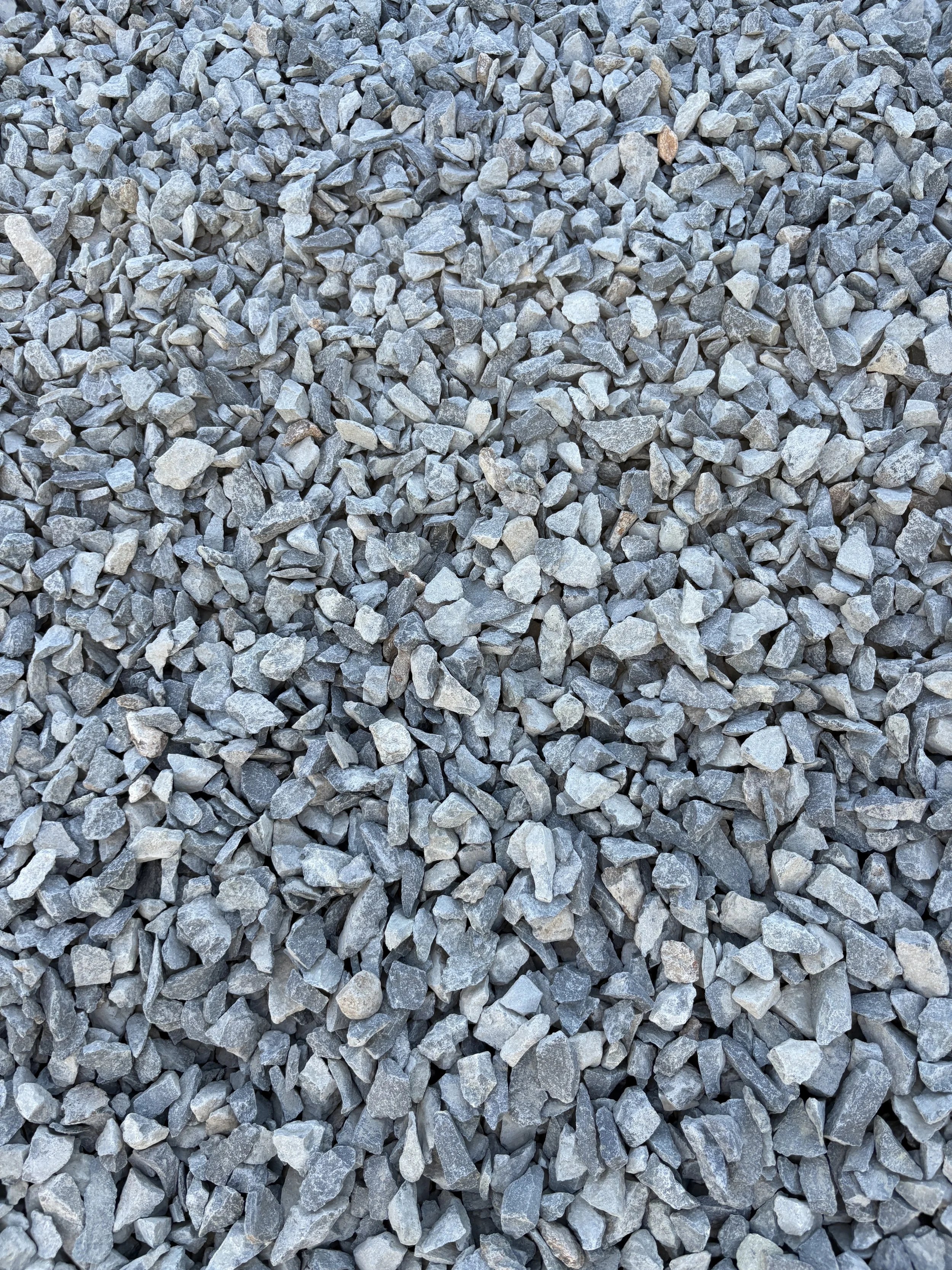 A large pile of small, gray gravel stones.
