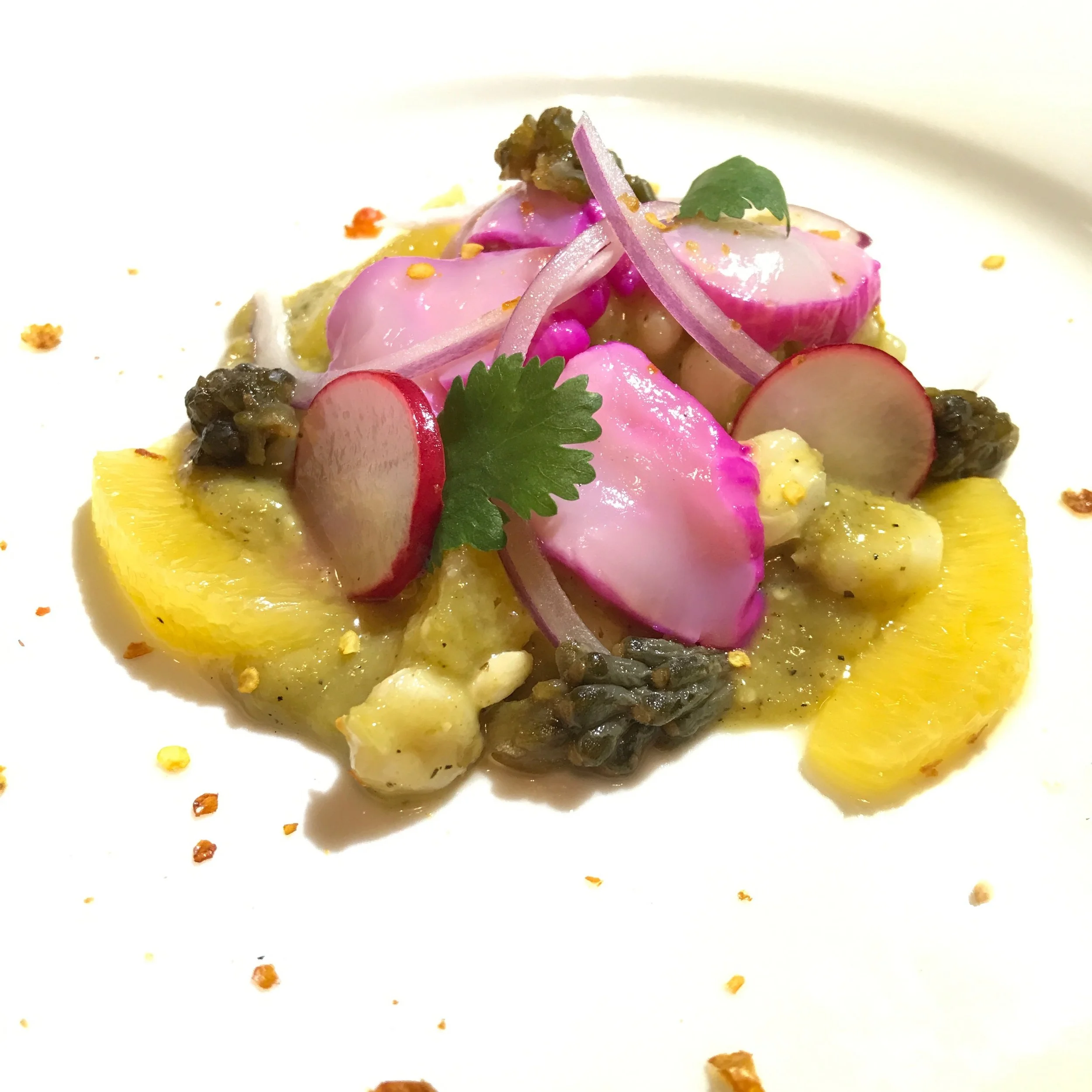 Chef Erika’s dish Prickly Pear and Lime Marinated Scallops Crudo with Tomatillo and Maize Salad, Pickled Cholla Bud, Radish and Chiltepin