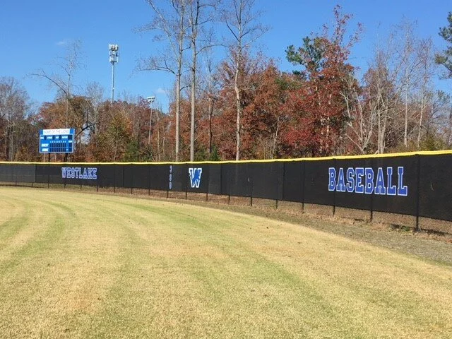 Custom printed windscreen shown in the Byron Fence product gallery