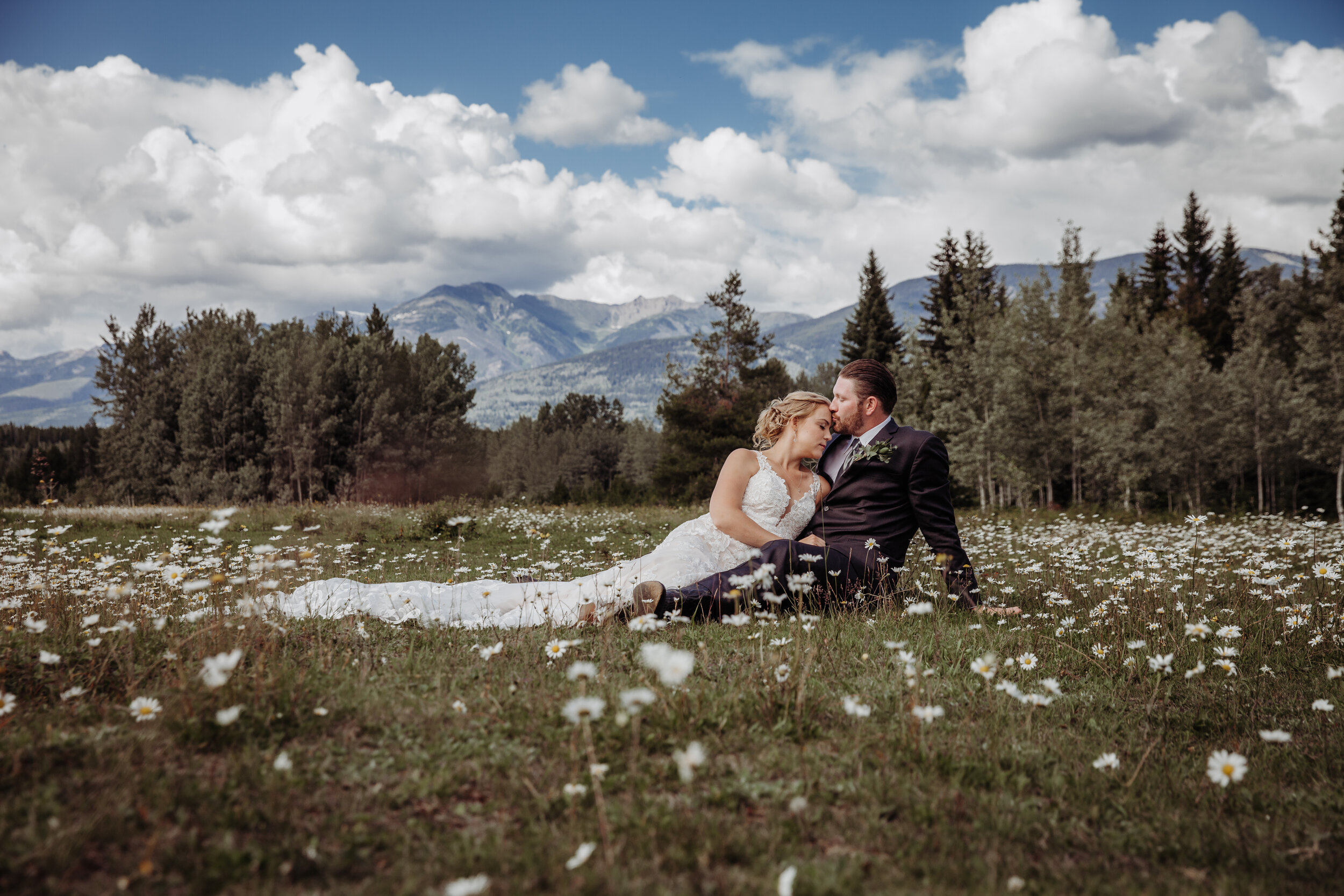 Bride & Groom with daisies in Valemount, BCBride & Groom in the Rocky Mountains | Jamie Robson Photography | Elopement & Wedding Photographer in Jasper (Copy)