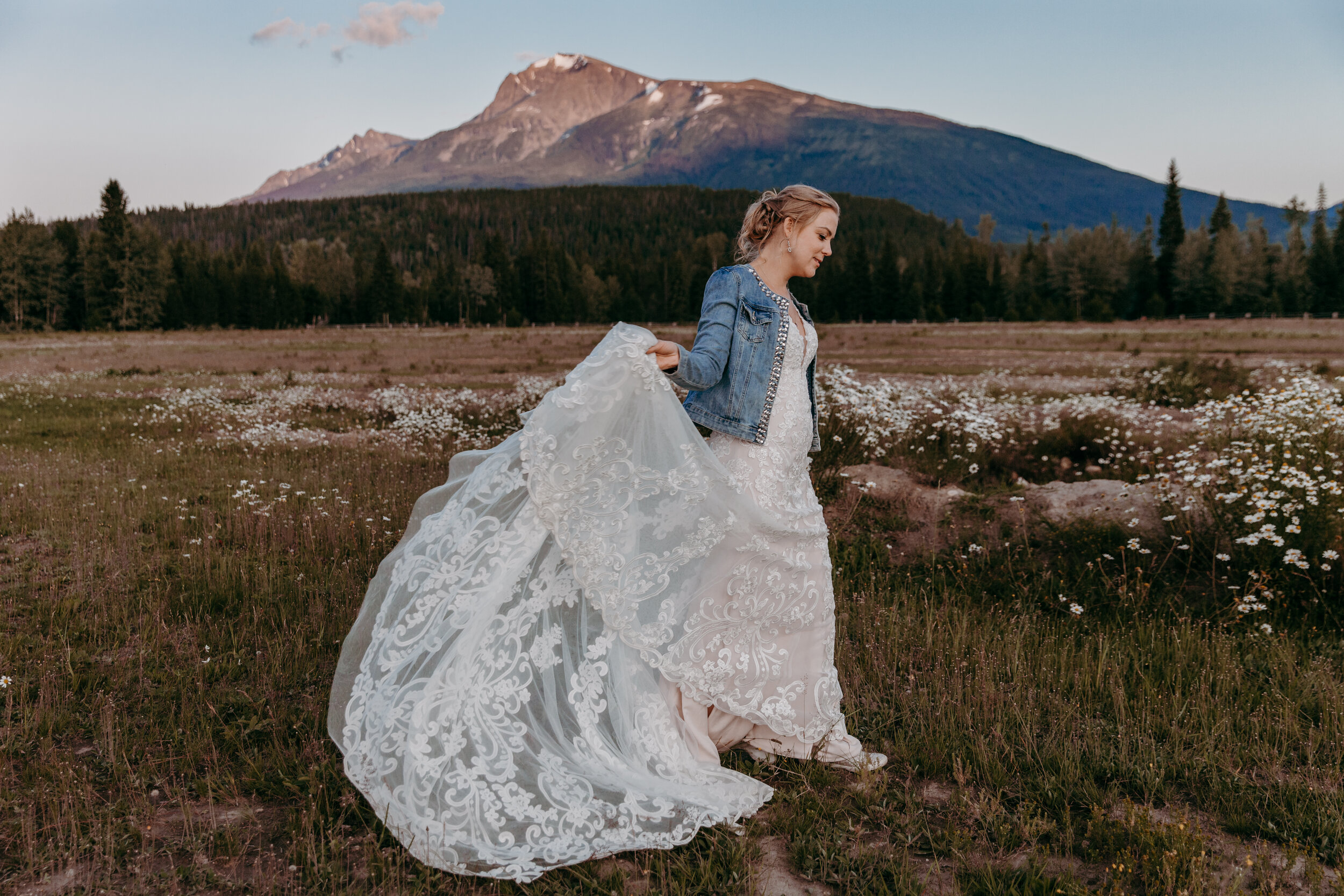 Bride twirling dress in Rocky MountainsBride & Groom in the Rocky Mountains | Jamie Robson Photography | Elopement & Wedding Photographer in Jasper (Copy)