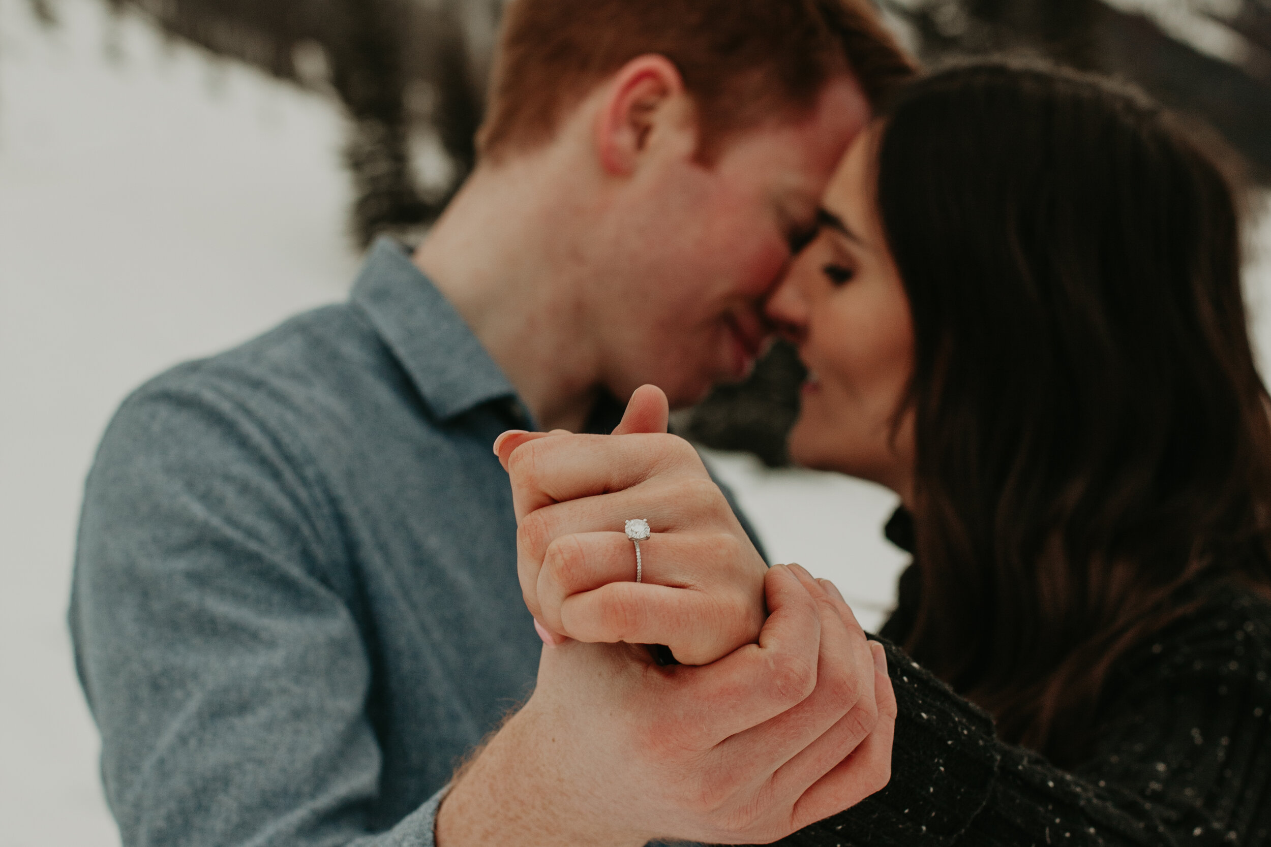 Couple Showing Engagement Ring | Jamie Robson Photography | Engagement Photographer in Jasper (Copy)