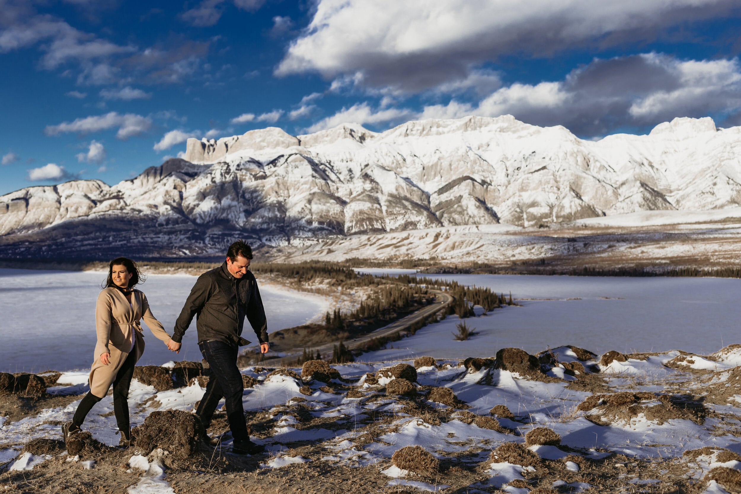 Couple walking on a mountaintop | Jamie Robson Photography | Engagement Photographer in Jasper (Copy)