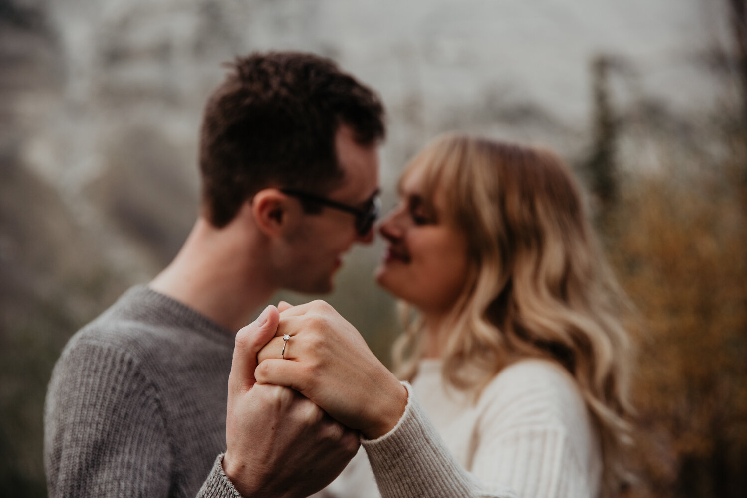 Couple showing Engagement Ring | Jamie Robson Photography | Engagement Photographer in Jasper (Copy)