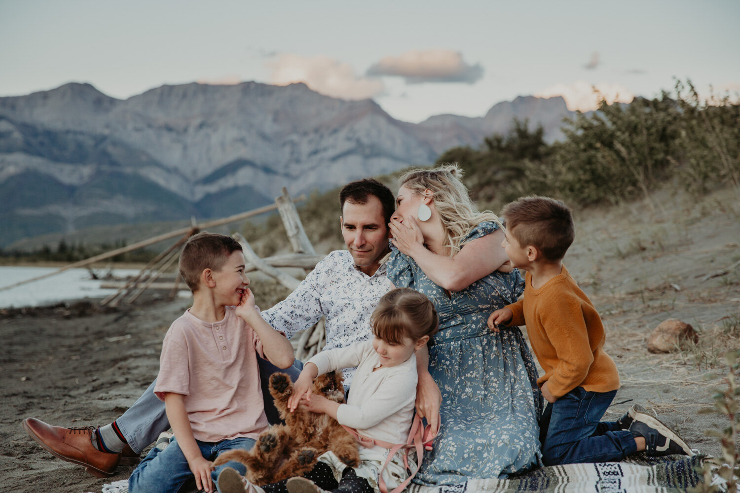 Family telling secrets in the mountains | Jamie Robson Photography | Family Photographer in Jasper (Copy)