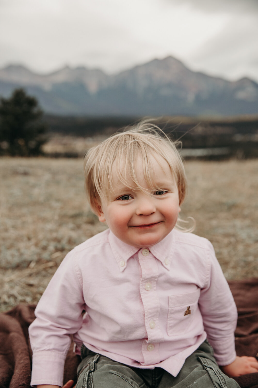 Boy smiling in the mountains | Jamie Robson Photography | Family Photographer in Jasper (Copy)