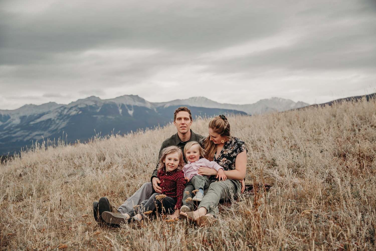 Family sitting on mountain top  | Jamie Robson Photography | Family Photographer in Jasper (Copy)