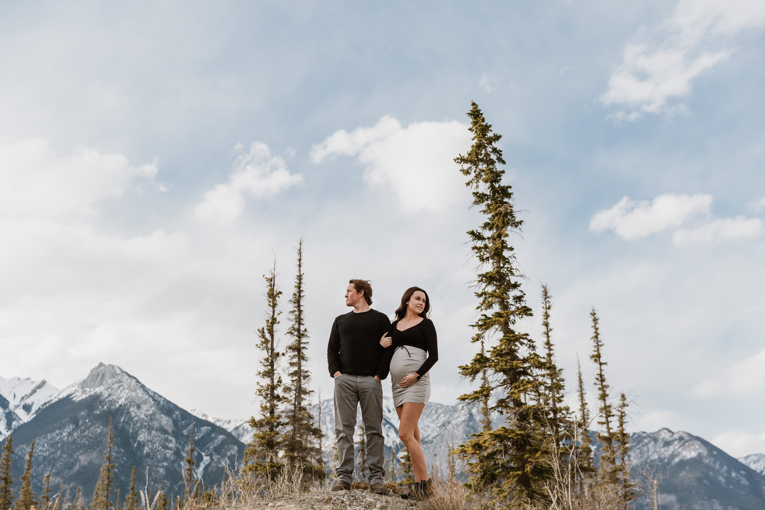 Man and woman in rocky mountains| Jamie Robson Photography | Maternity Photographer in Jasper (Copy)