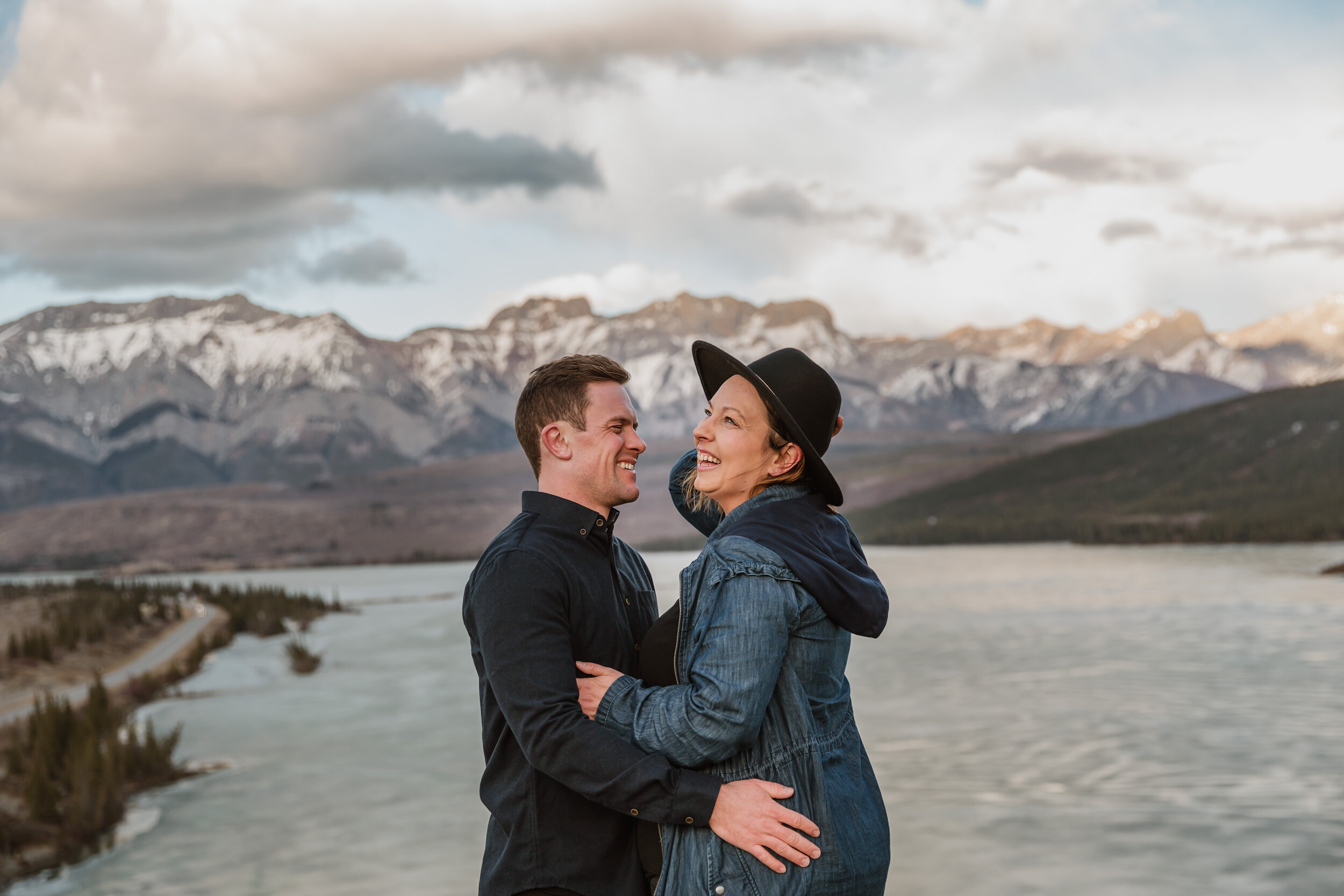 Couple laughing on mountaintop | Jamie Robson Photography | Engagement Photographer in Jasper (Copy)