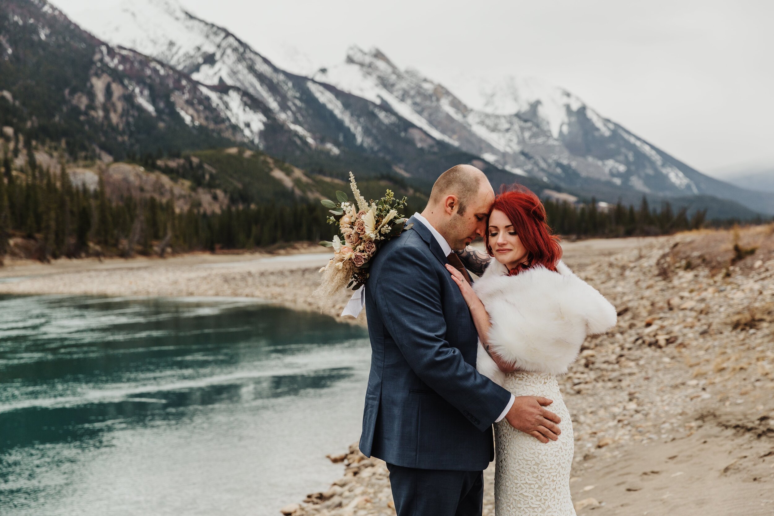 Couple by the river in the mountains | Jamie Robson Photography | Elopement & Wedding Photographer in Jasper (Copy)