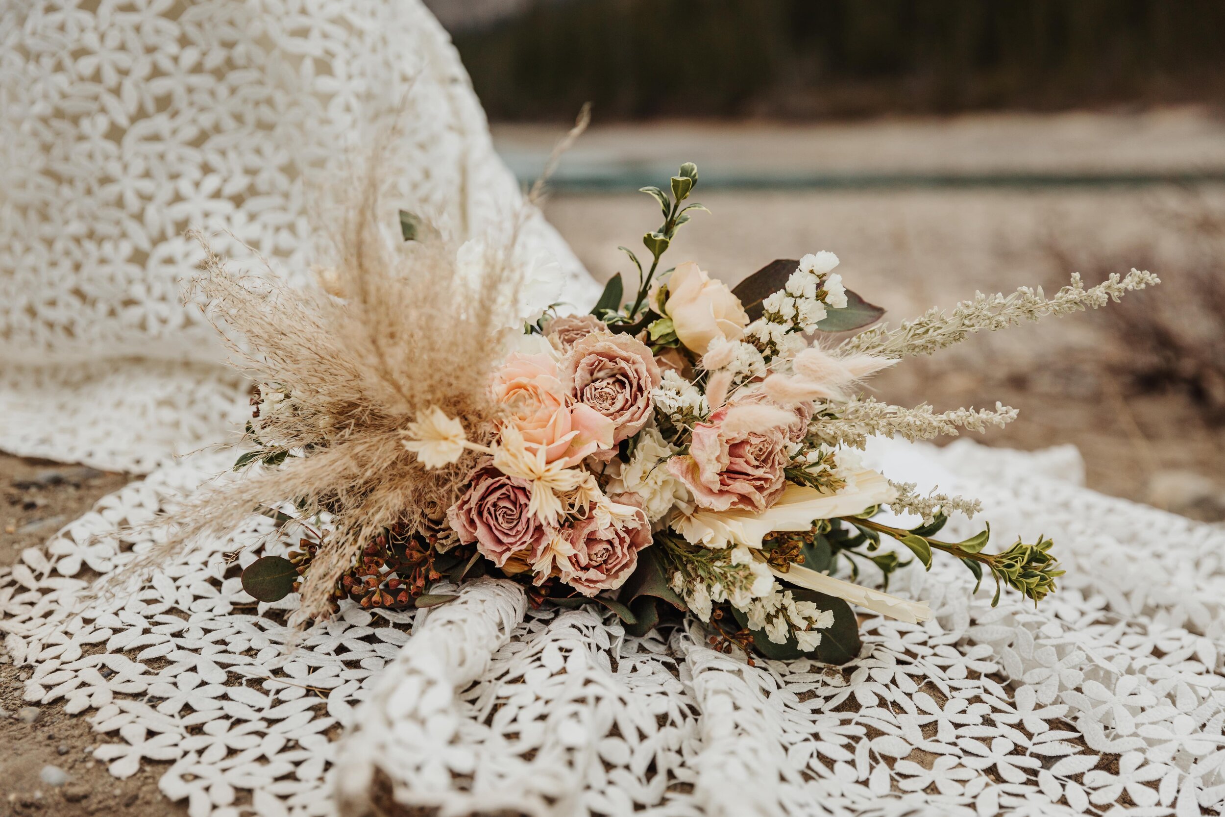 Elysion Florals on bride's dress | Jamie Robson Photography | Elopement & Wedding Photographer in Jasper (Copy)