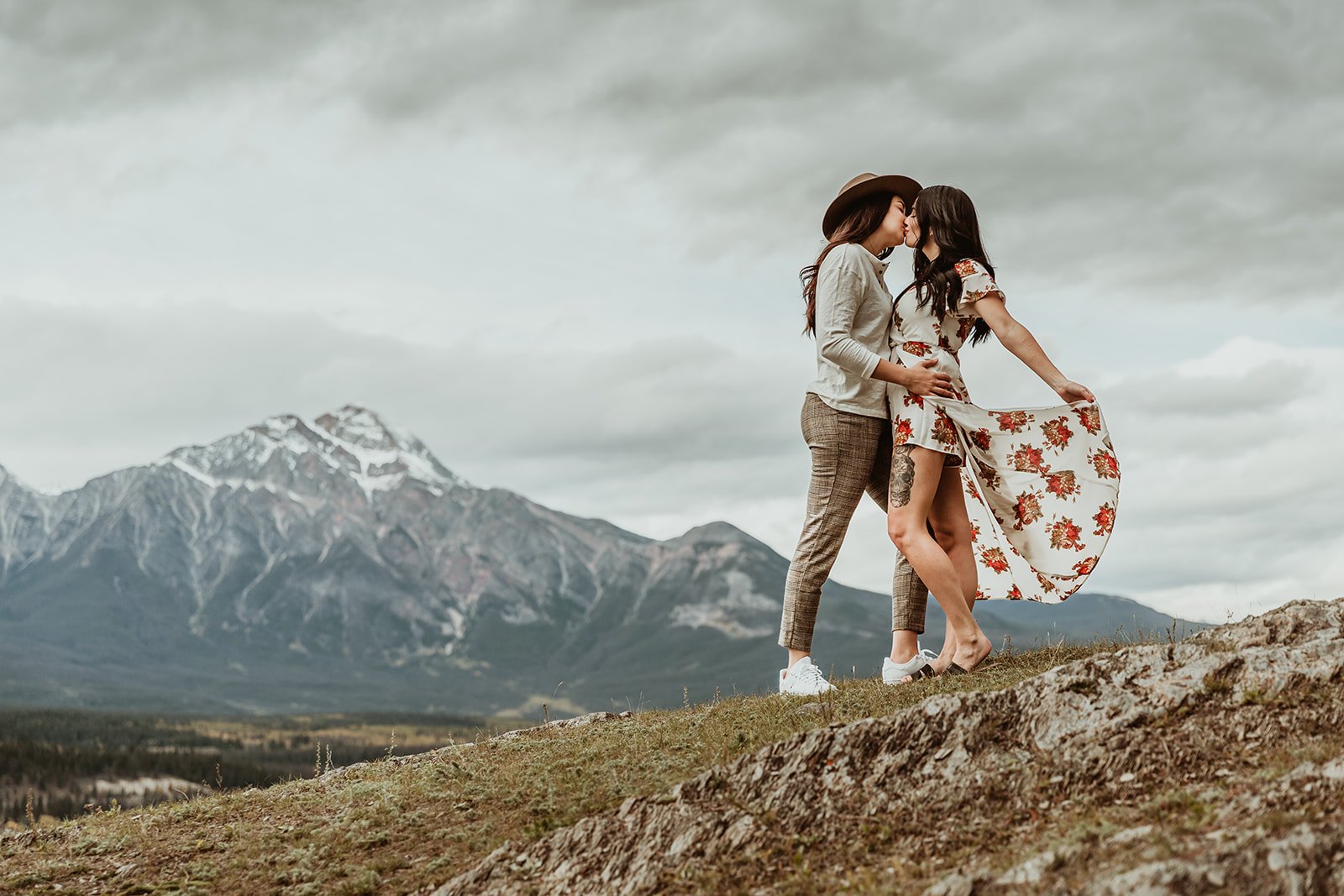 Two women kissing on mountain top | Jamie Robson Photography | Engagement Photographer in Jasper (Copy)