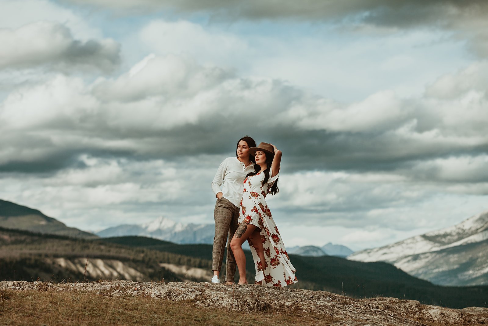 Two women standing on mountain top | Jamie Robson Photography | Engagement Photographer in Jasper (Copy)