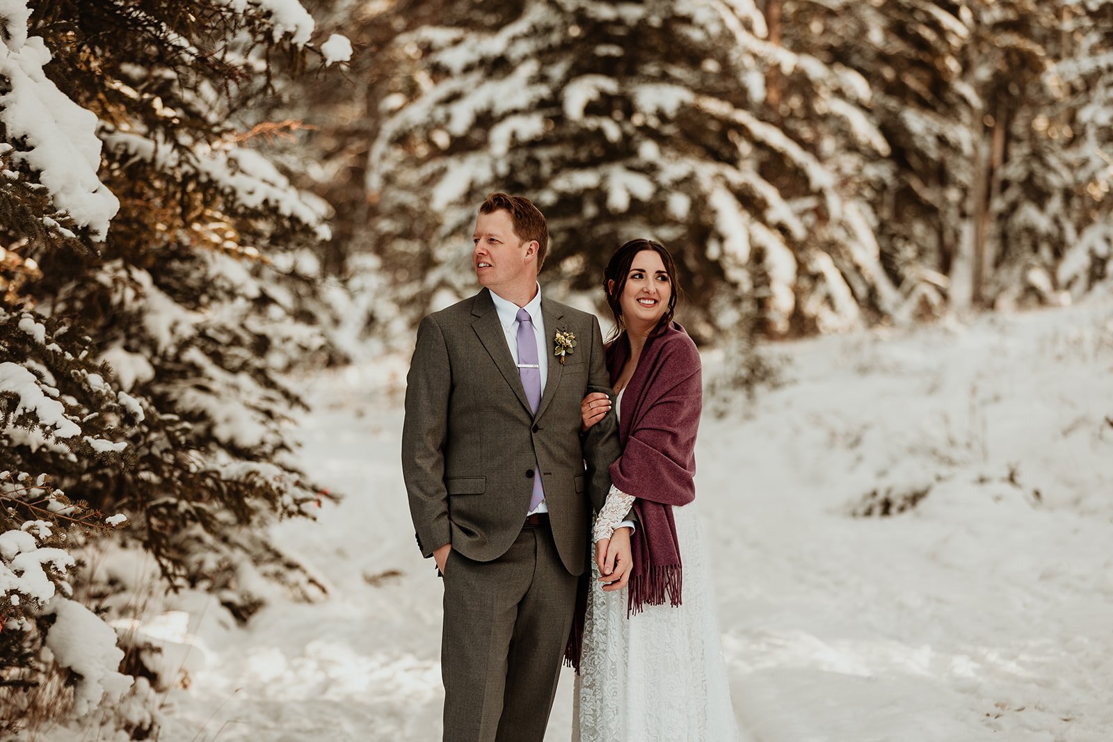 Bride & Groom snuggle in snow and tress  | Jamie Robson Photography | Elopement & Wedding Photographer in Jasper (Copy)