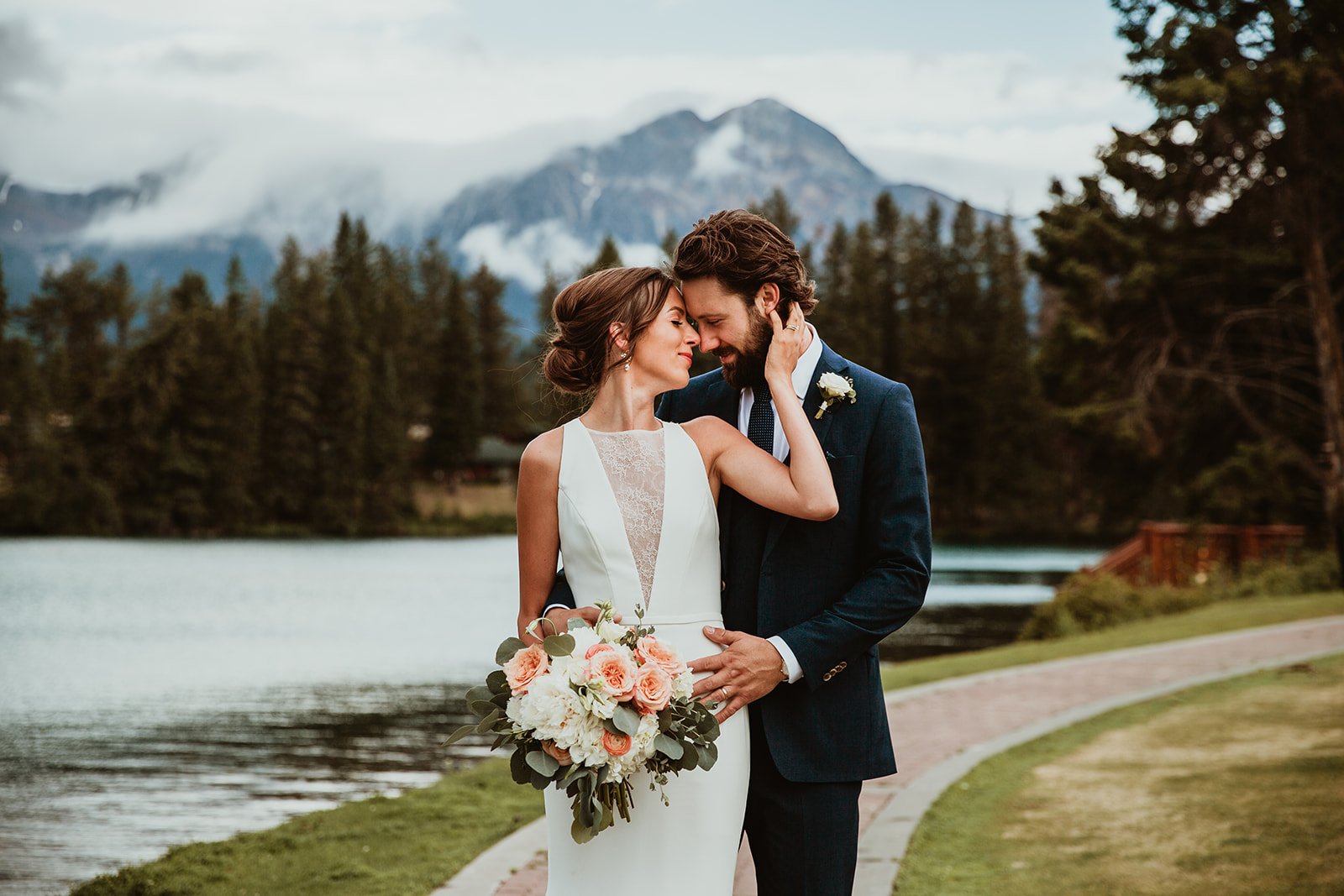 Bride & Groom Snuggle at Jasper Park Lodge Wedding | Jamie Robson Photography | Elopement & Wedding Photographer in Jasper (Copy)