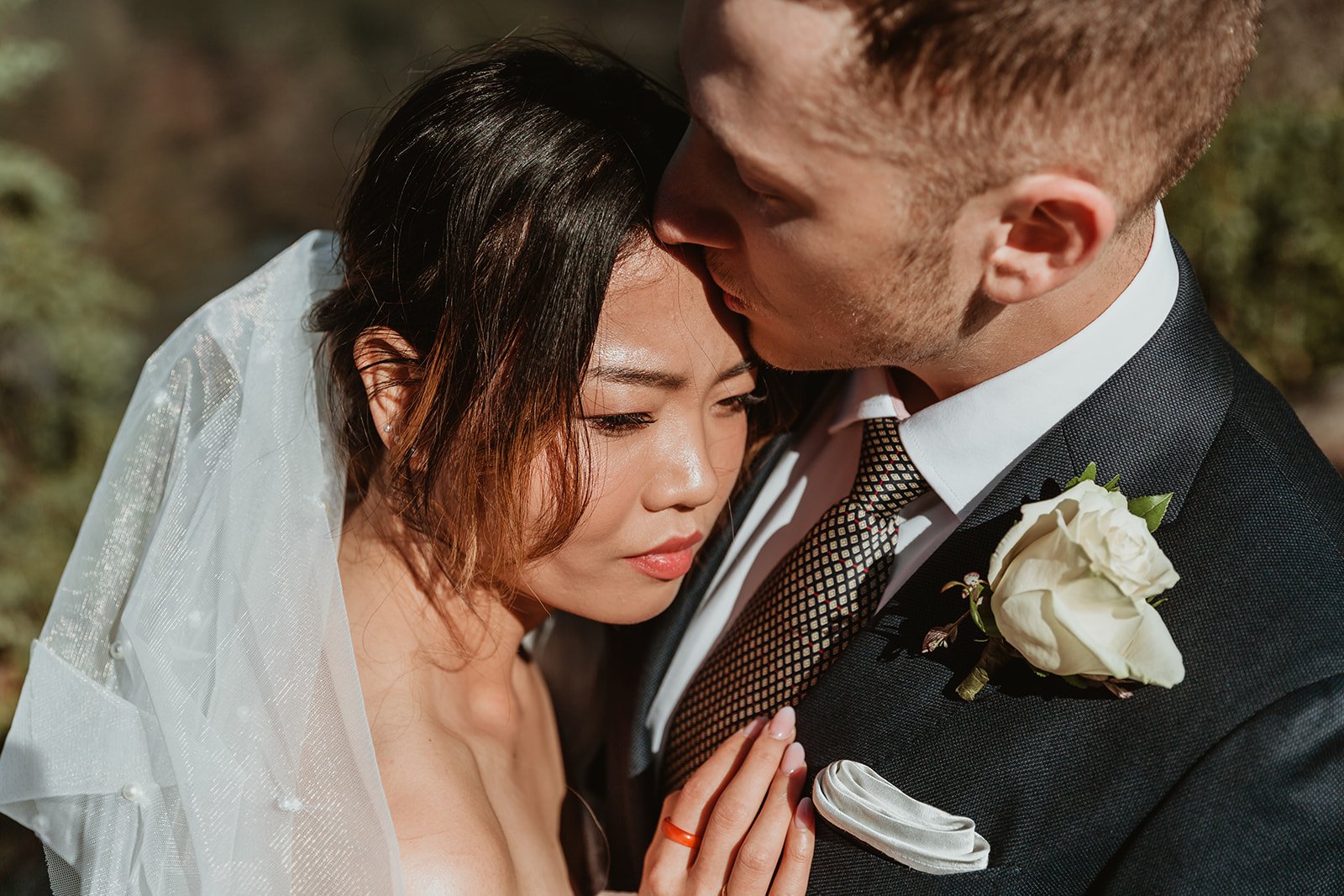 Groom kisses Bride  | Jamie Robson Photography | Elopement & Wedding Photographer in Jasper (Copy)
