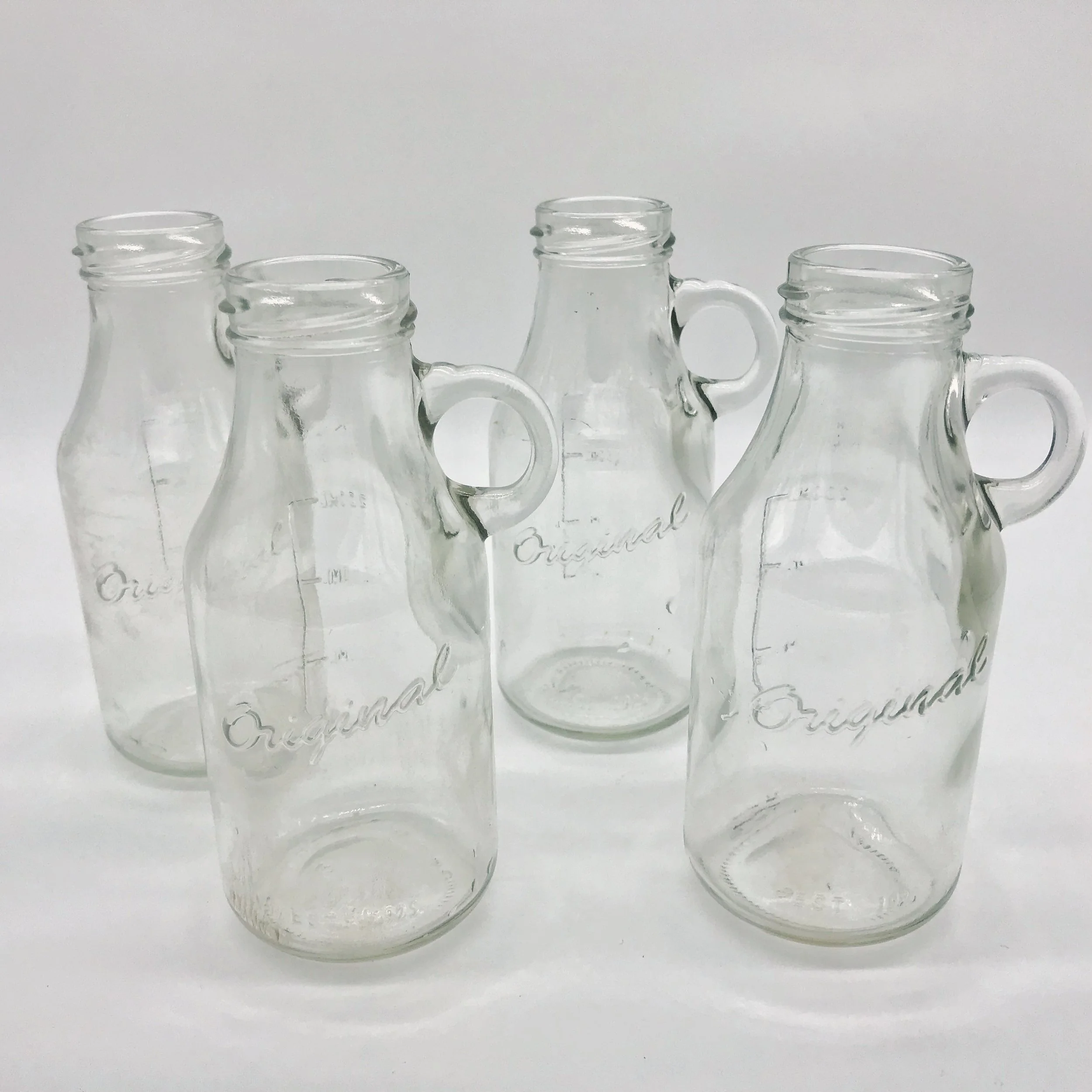 Vintage milk bottles Price: $0.50 Qty: 9