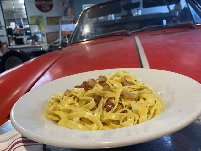 Pasta at the vintage car table at Garage Buona Forchetta on Coronado Island