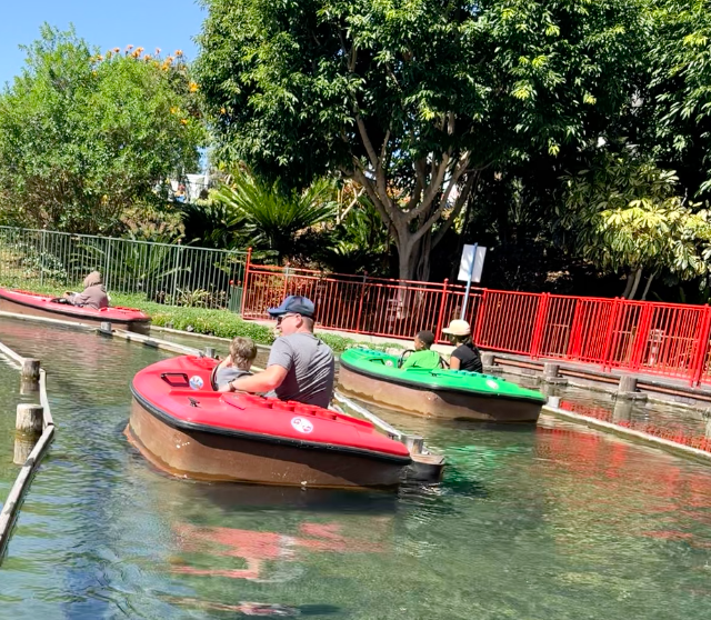 3-year-old driving the boat in Skipper School