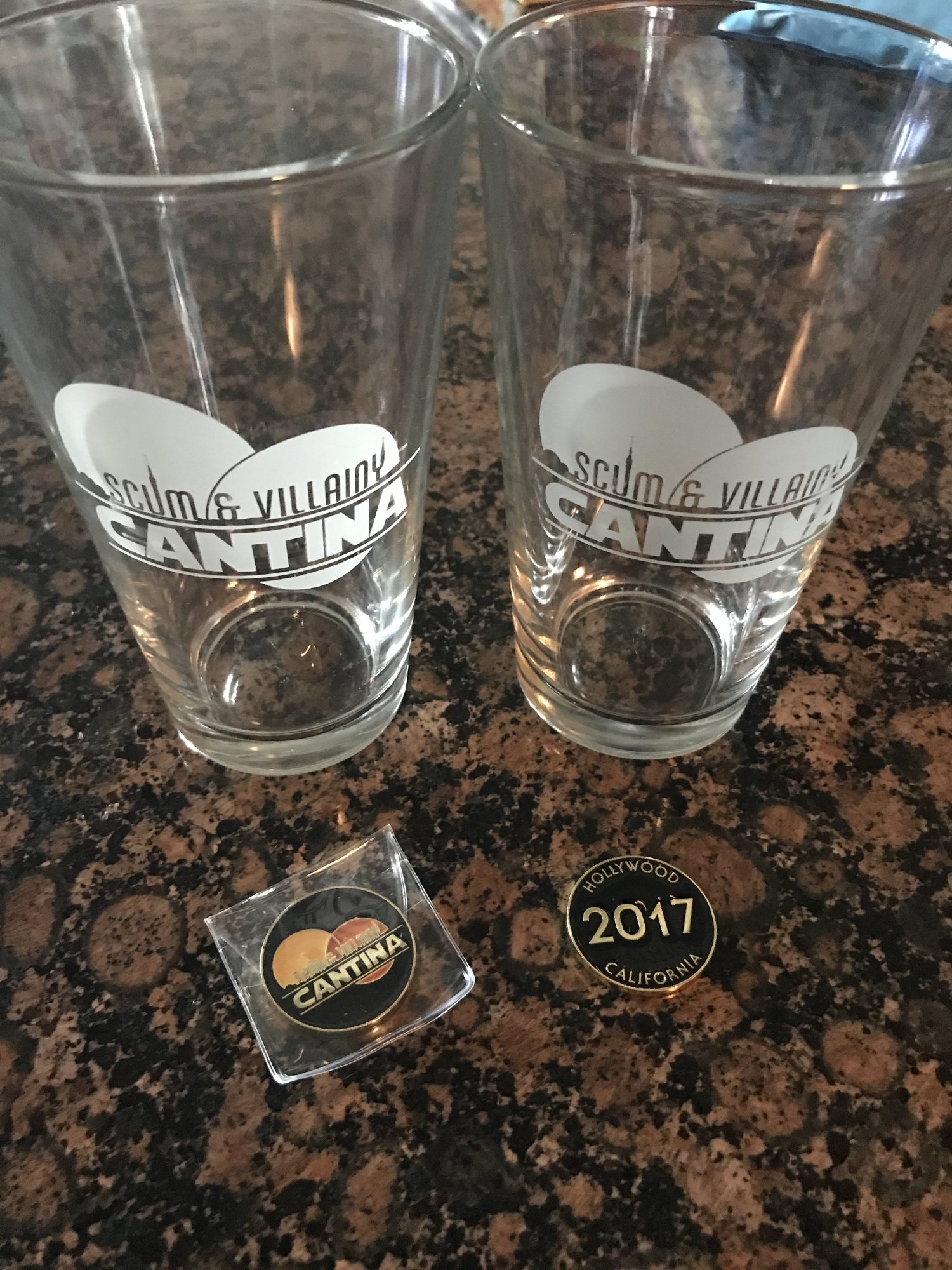 Scum and Villainy+Cantina+challenge+coin+and+Pint+glass_Star+Wars+Bar.jpeg