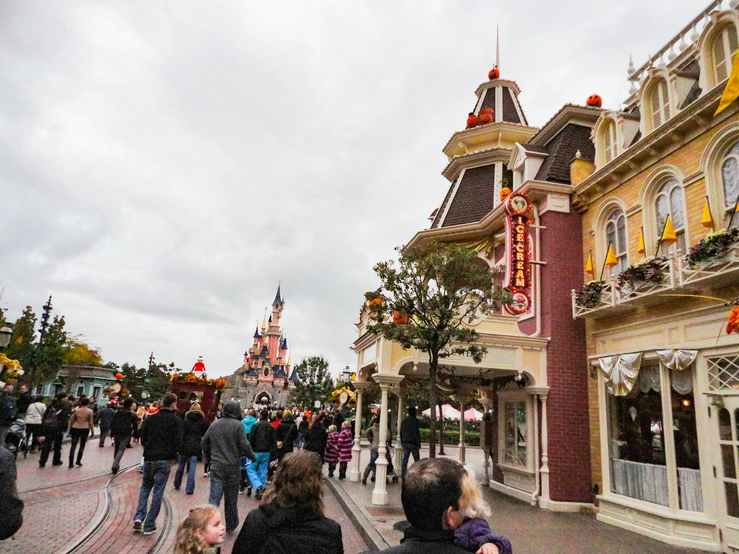 Walking down Main Street with a view of the castle at Disneyland Paris