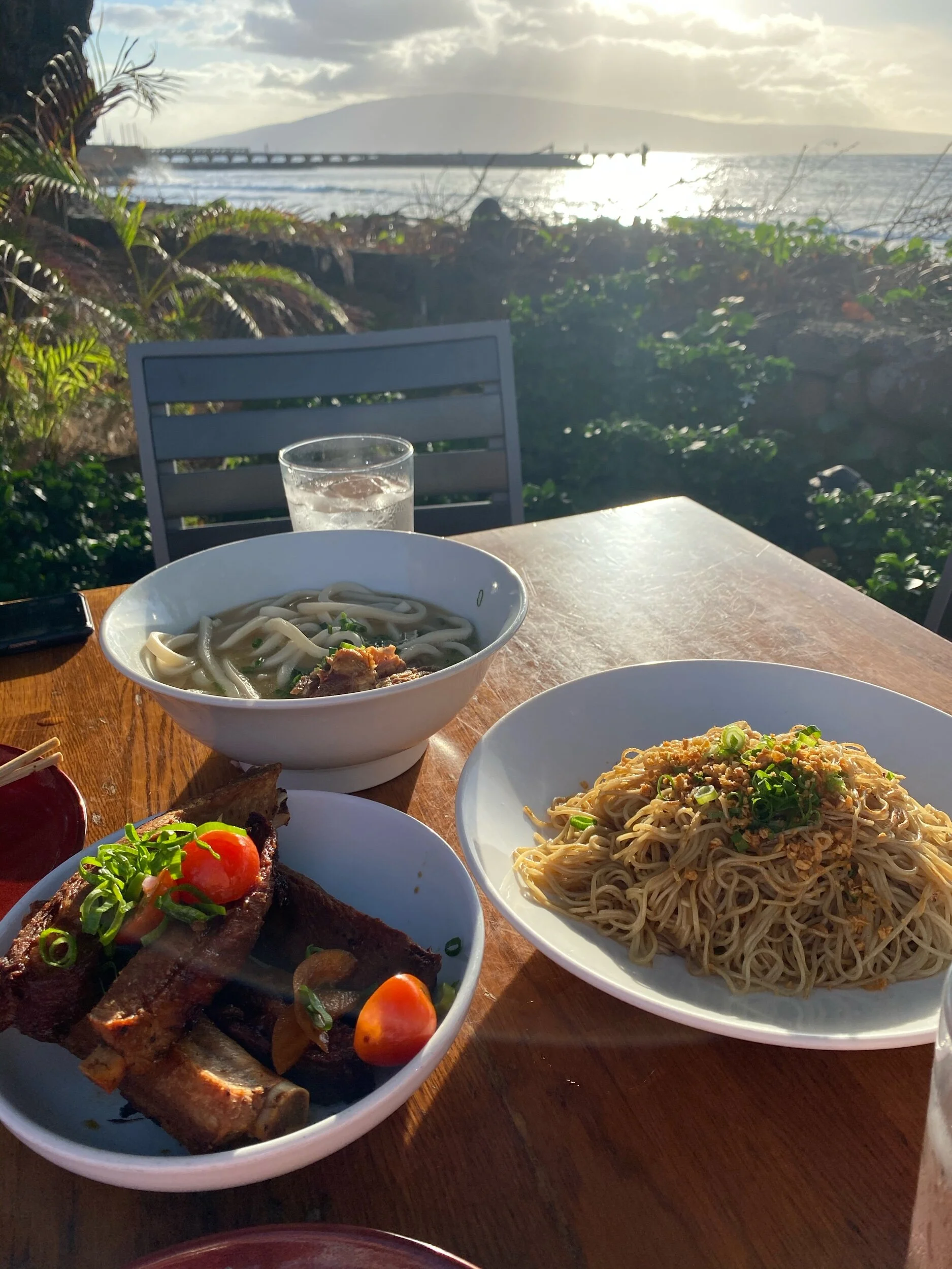 Clockwise from top: Star Udon, Garlic Noodles, Adobo Ribs