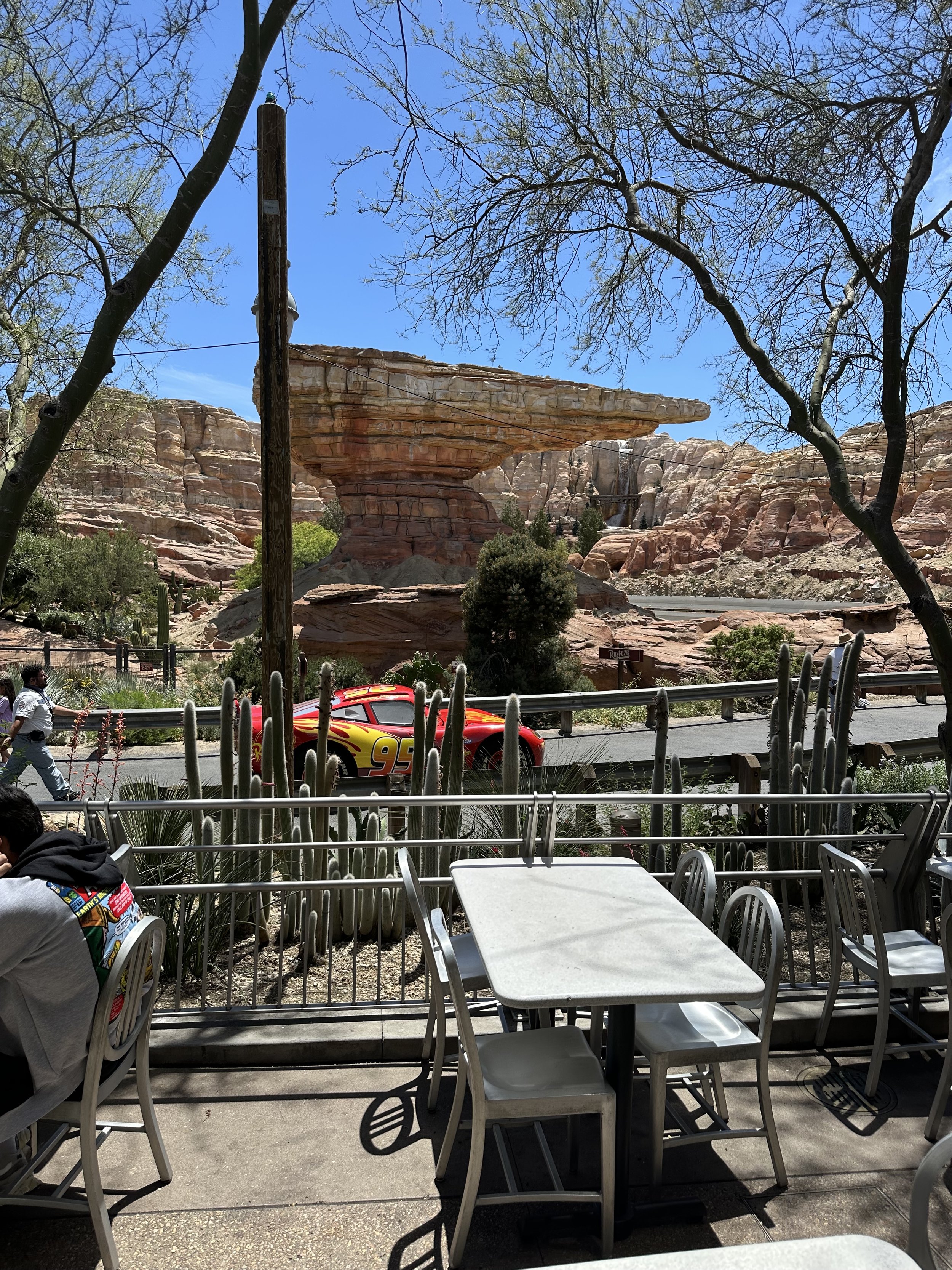 Lightning McQueen driving through Radiator Springs in California Adventure