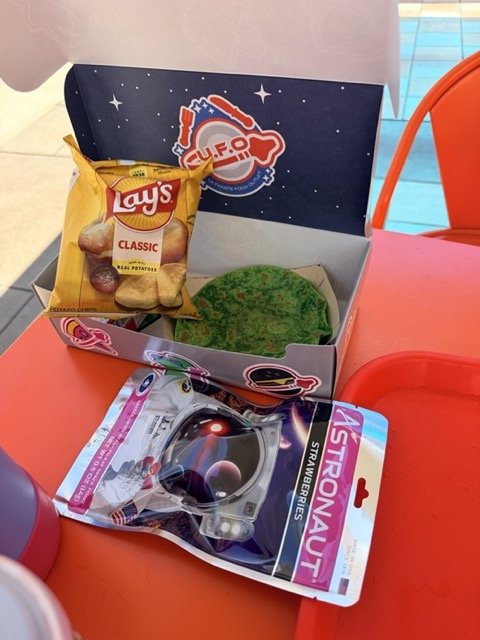 Green UFO-shaped quesadilla kids meal at LEGO Galaxy in LEGOLAND California