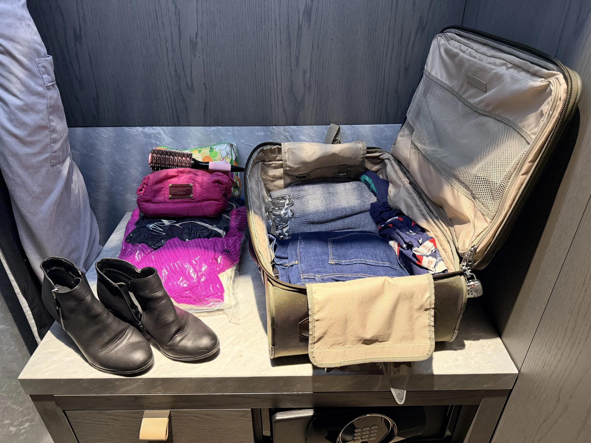 Clothes, bags, and shoes for Winter packing essentials for wine tasting in Napa