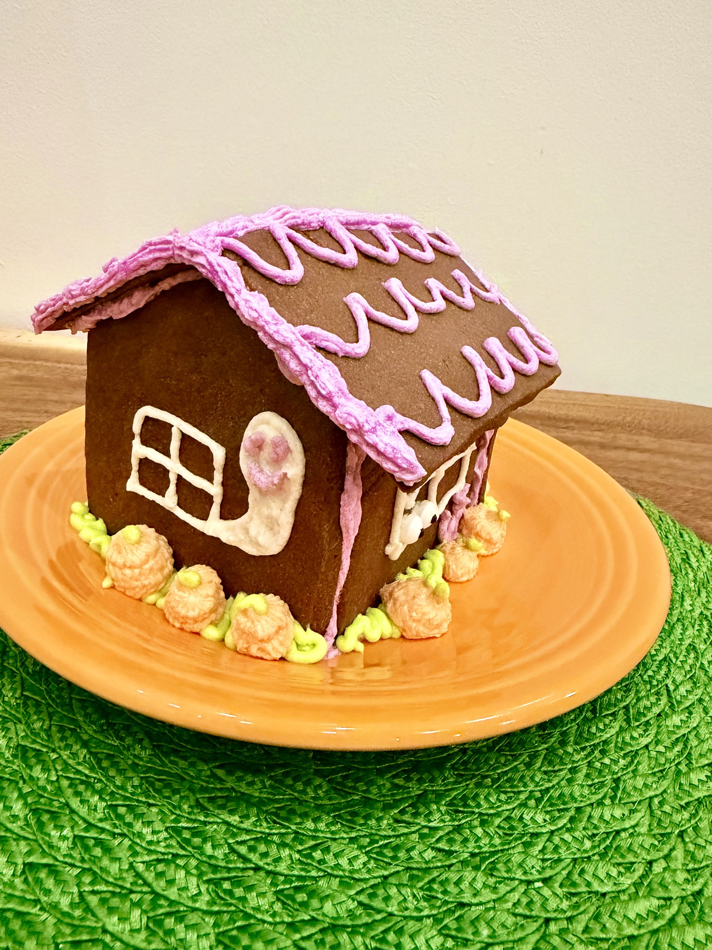 Frosting Friendly Ghost on Chocolate cookie house