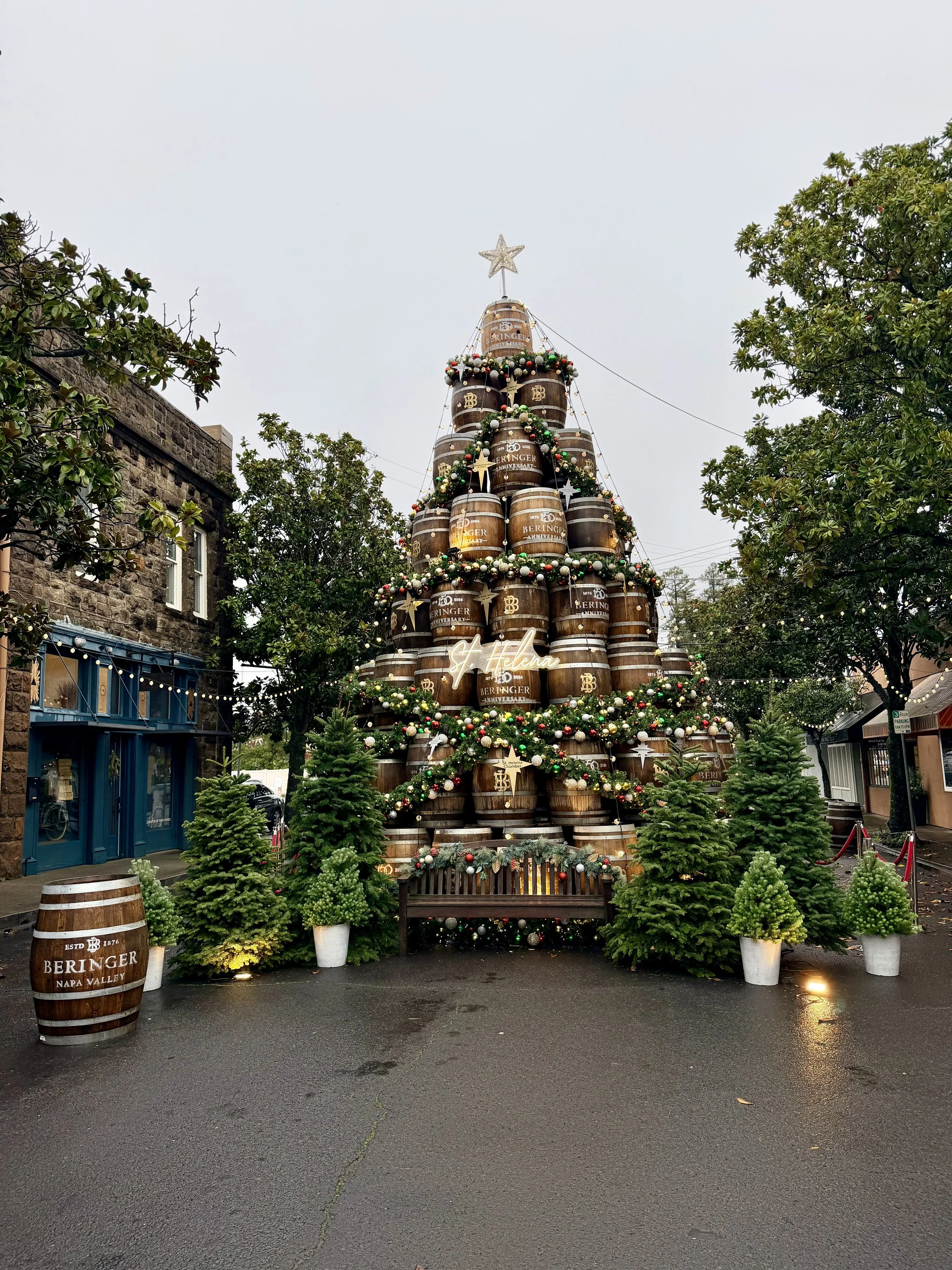 Barrels stacked like a Christmas tree in St. Helena near Napa valley with ornaments and garlands