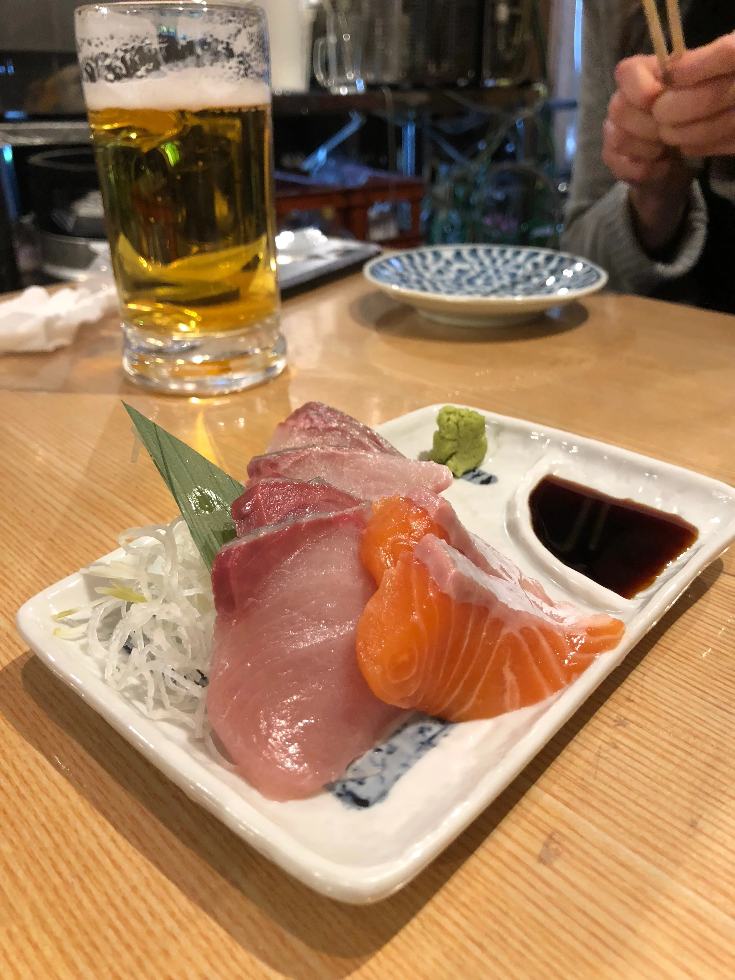 cuts of tuna and salmon with a soy sauce dip—a classic!