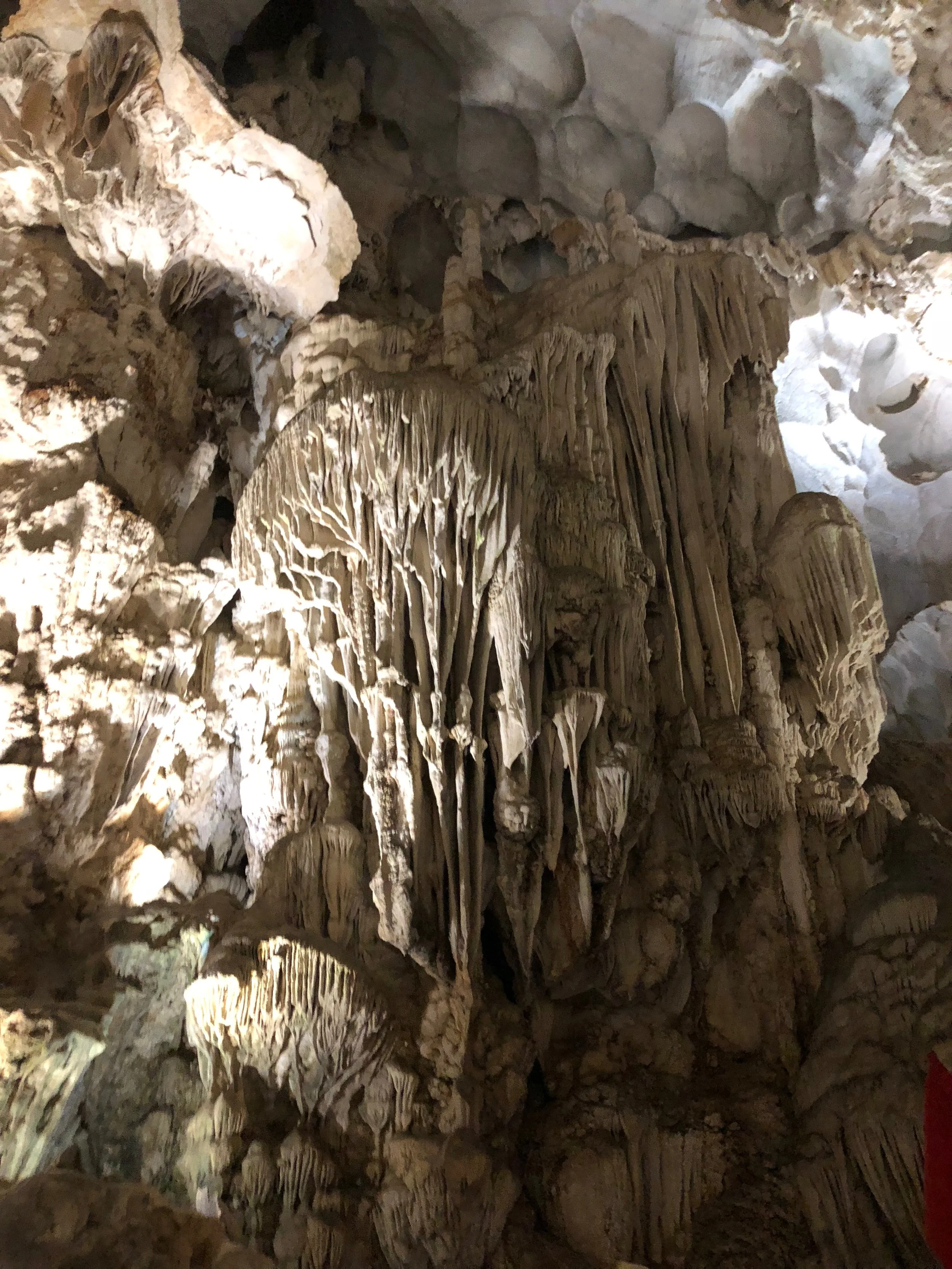Inside of one of the karsts: the stalagmites and stalactites are created by the drainage of water from the caves. These specific caves in Ha Long Bay were discovered by local fishermen.