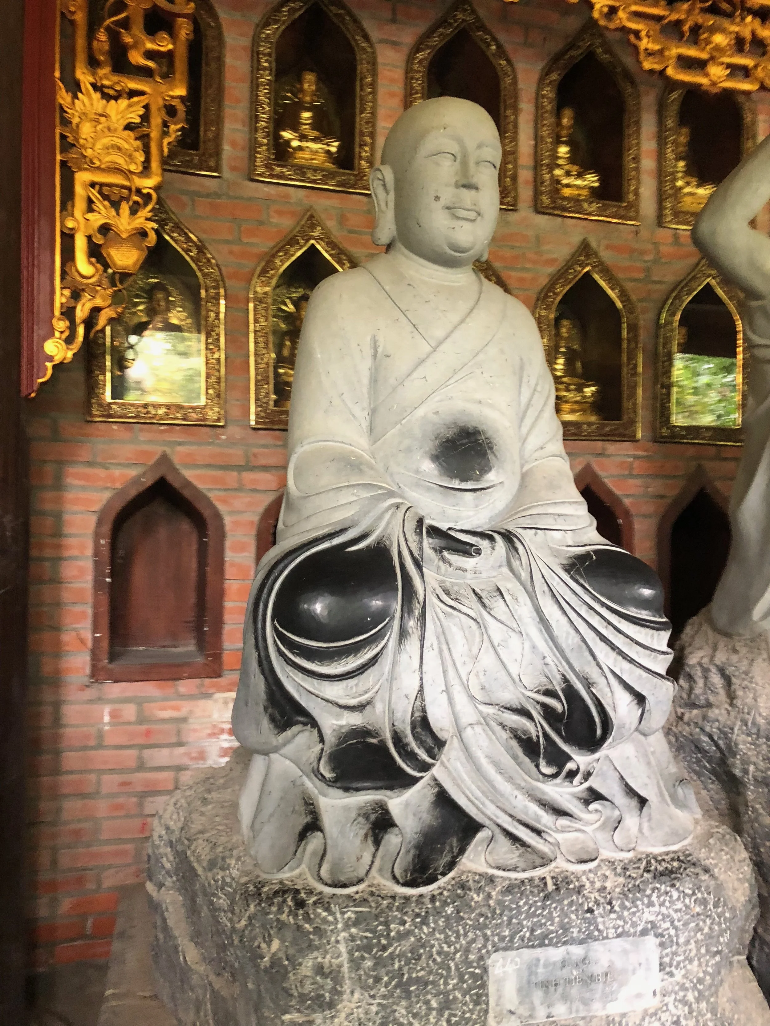 One statue along the way to the Bái Đính Pagoda. You can see how the weathered the knees and feet are from where people have rubbed their hands on.