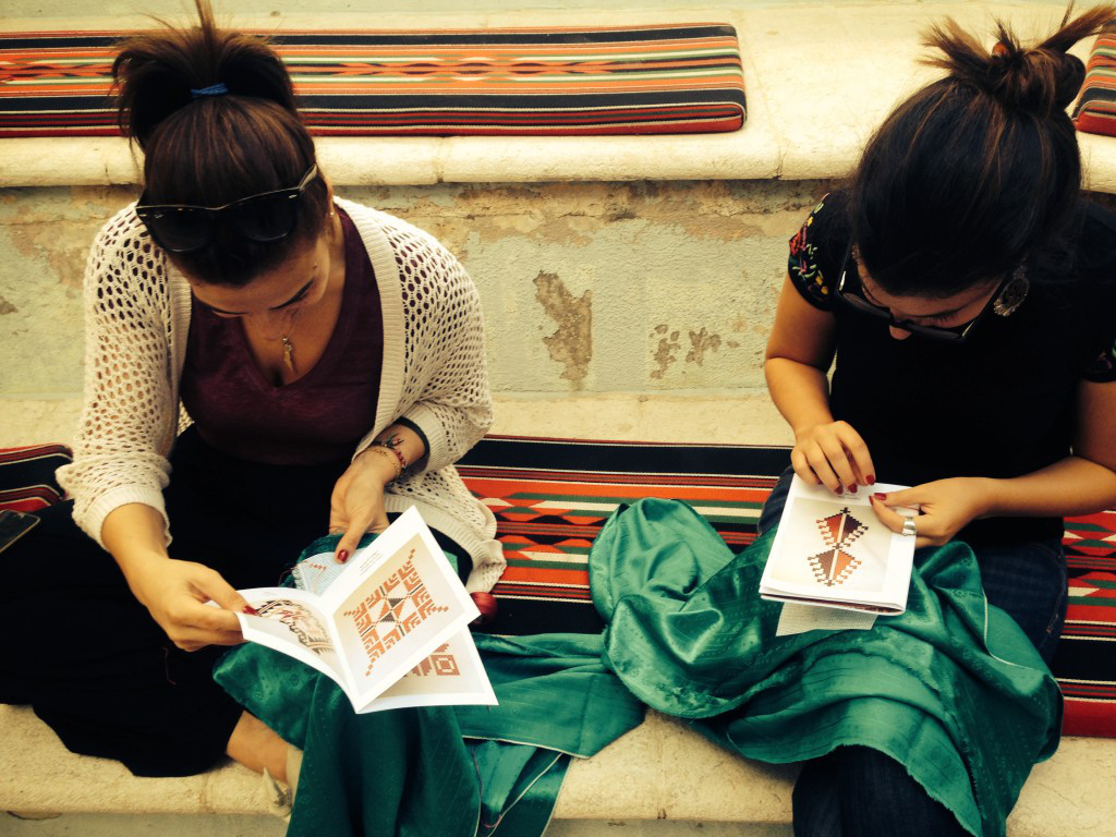 Taita Leila embroidering at the Ottoman Court in Ramallah