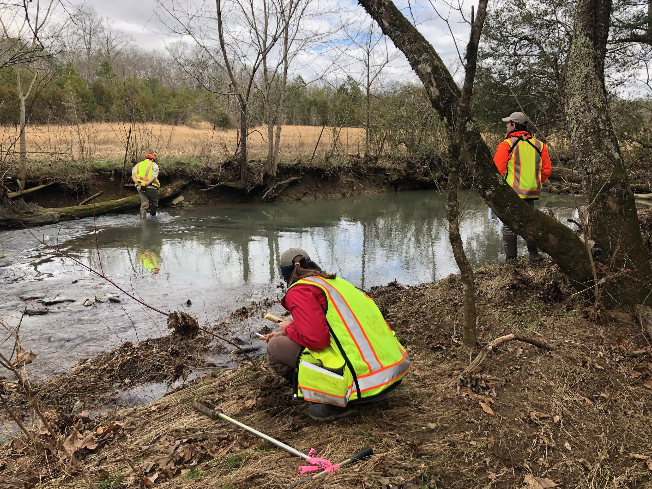 TVA employees along Gunstocker Creek, which is where you cross the private property being condemned on to the Project Viper site.