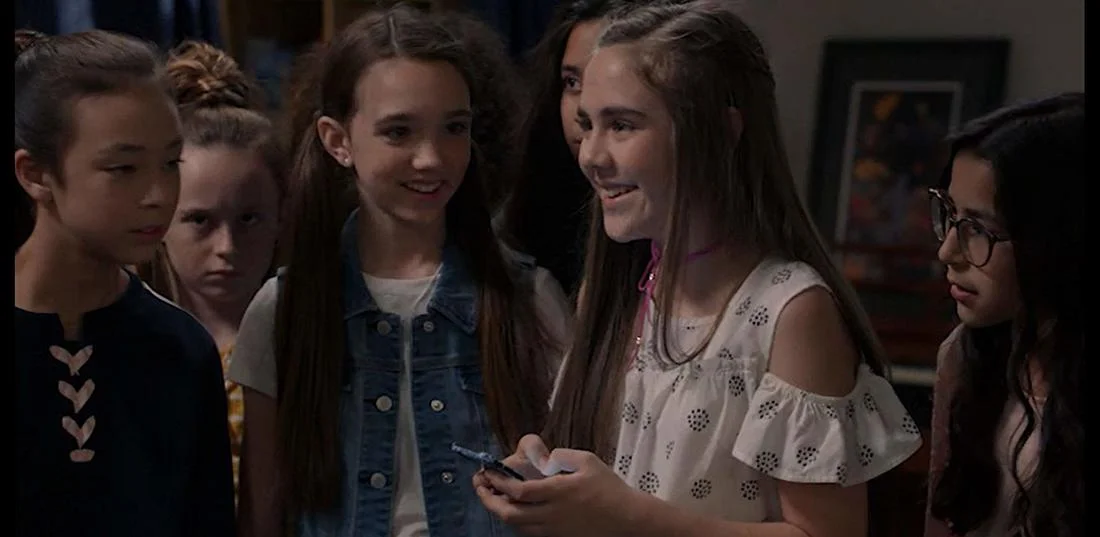 Ruby (second from left) on Modern Family
