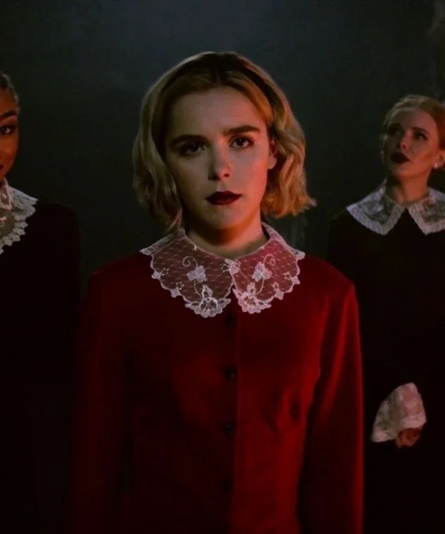 Lace collars take viewers back to old-school Salem; they look oh-so-chic....until the Dark Lord comes to play.