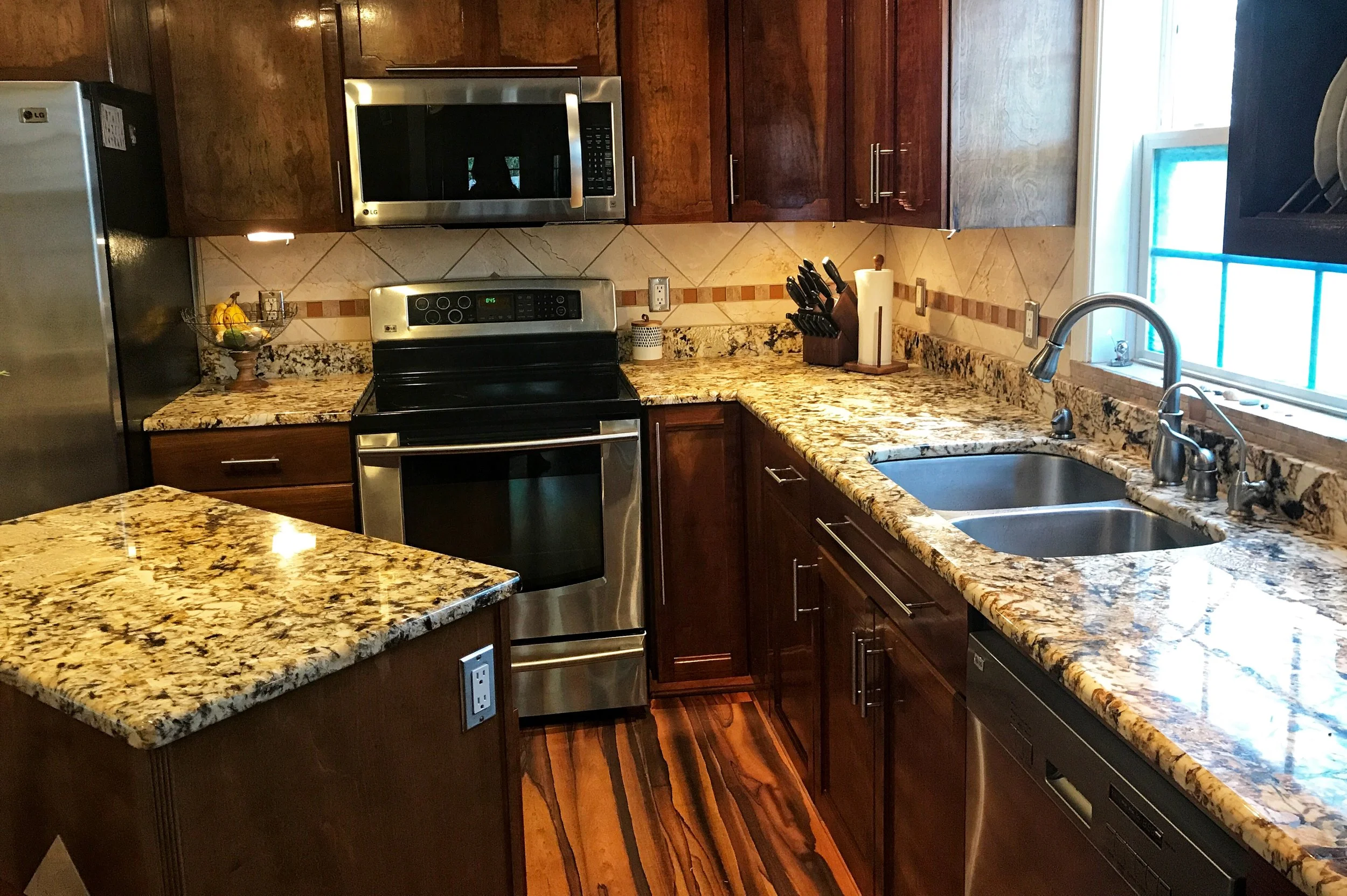 Our newly cleared counters (well, mostly cleared!) Just like clearing the dirty dishes, it only takes a few extra seconds to open a drawer or cabinet to get what we need.