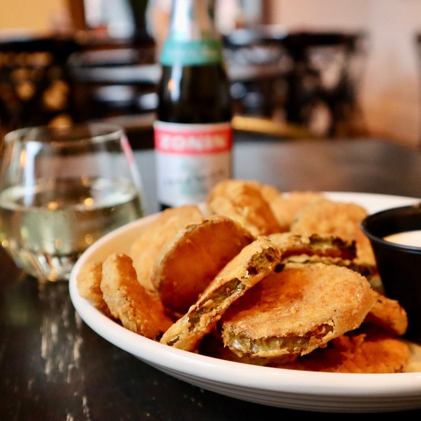 Come see why Zim's fried pickles are a fan favorite. Sliced pickles rolled in seasoned flour and fried with smoked tomato ranch. Drink at Thirsty and order food from @zimscafe!

We're located in the Old Courthouse at 215 West Main Street.
zimscafe.co